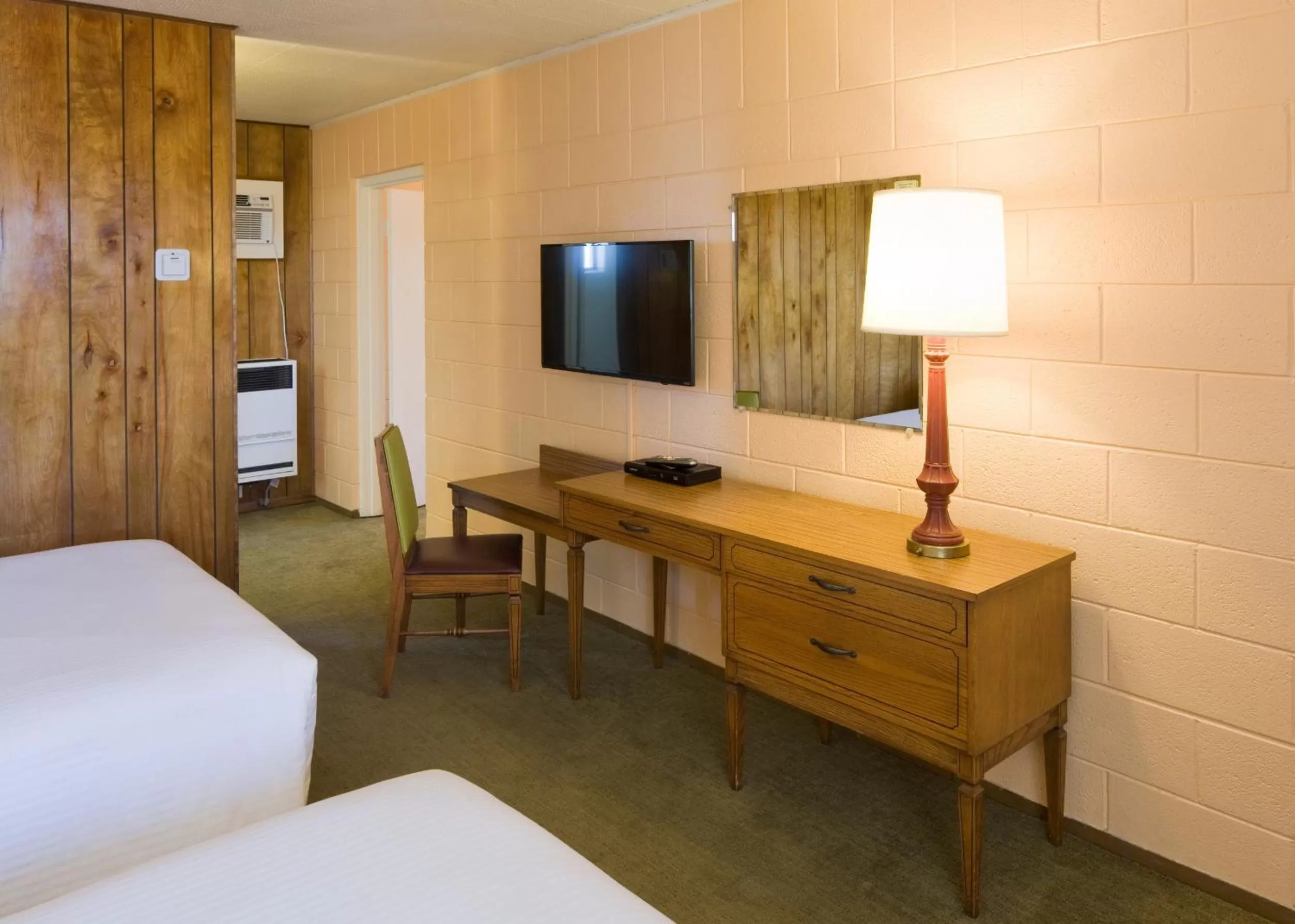 Bed in Sunset Motel Moriarty