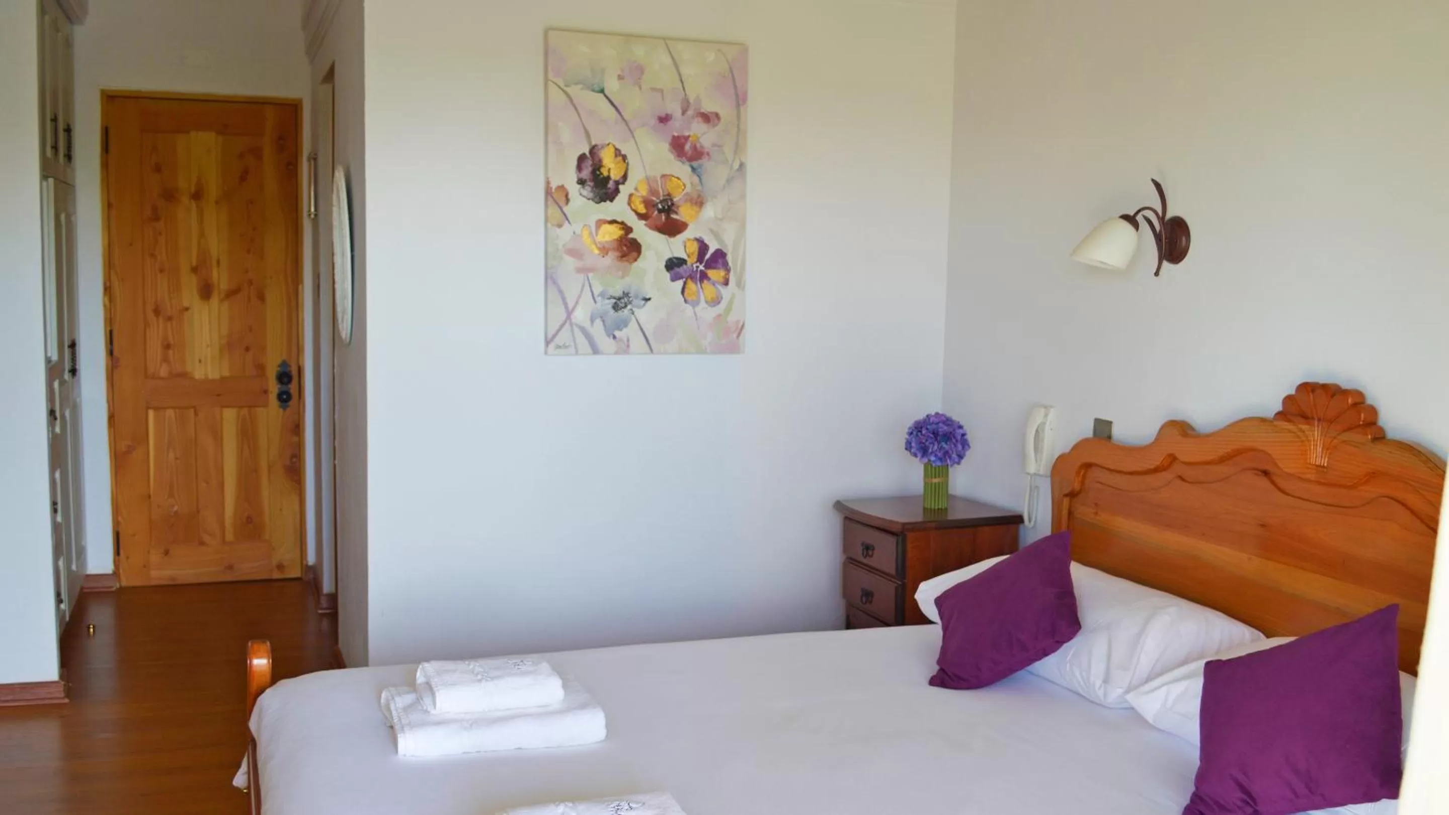 Bed in La Perla Hotel