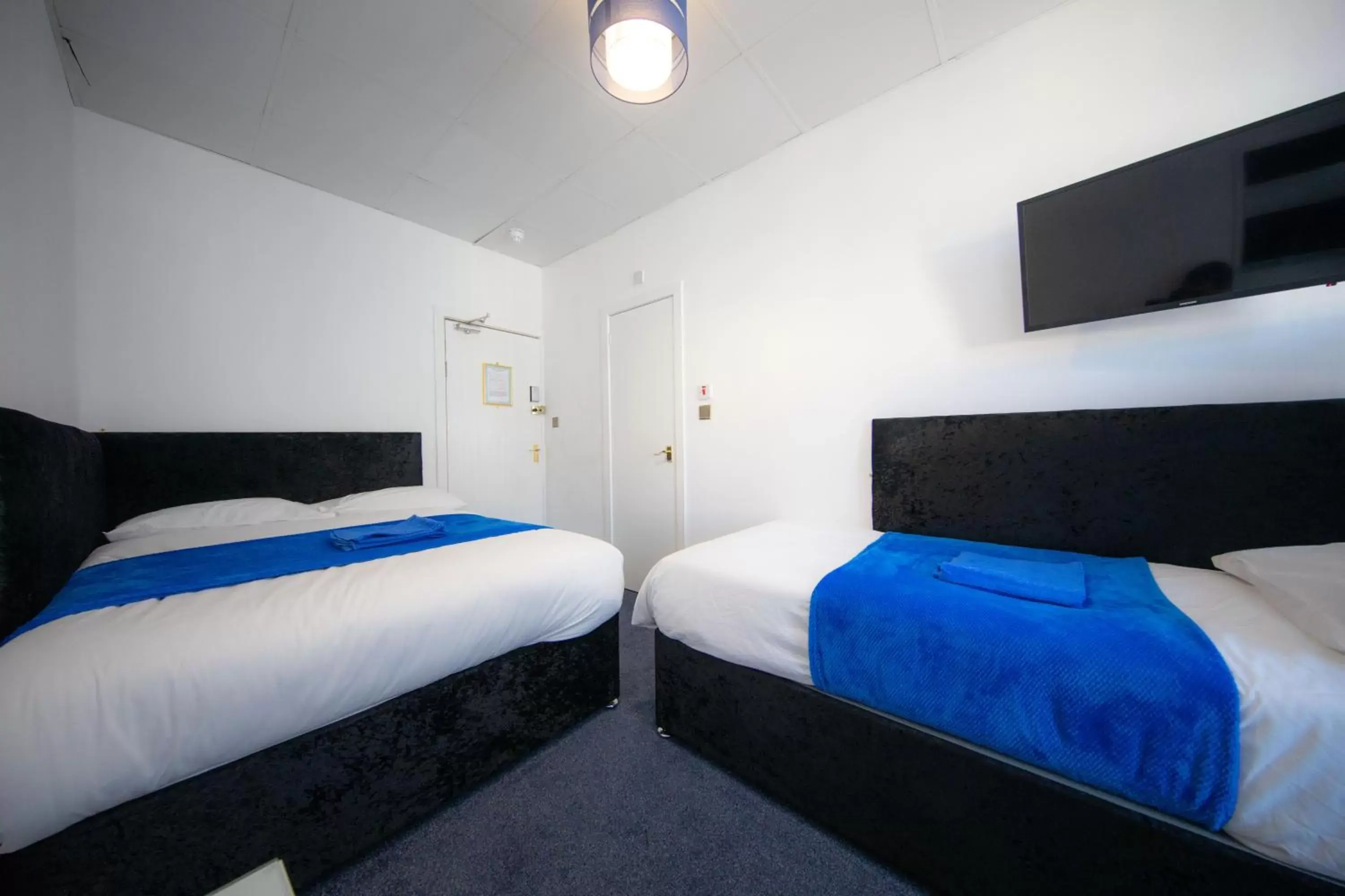 Economy Triple Room in The Adonis Hotel Economy Triple Room in The Adonis Hotel