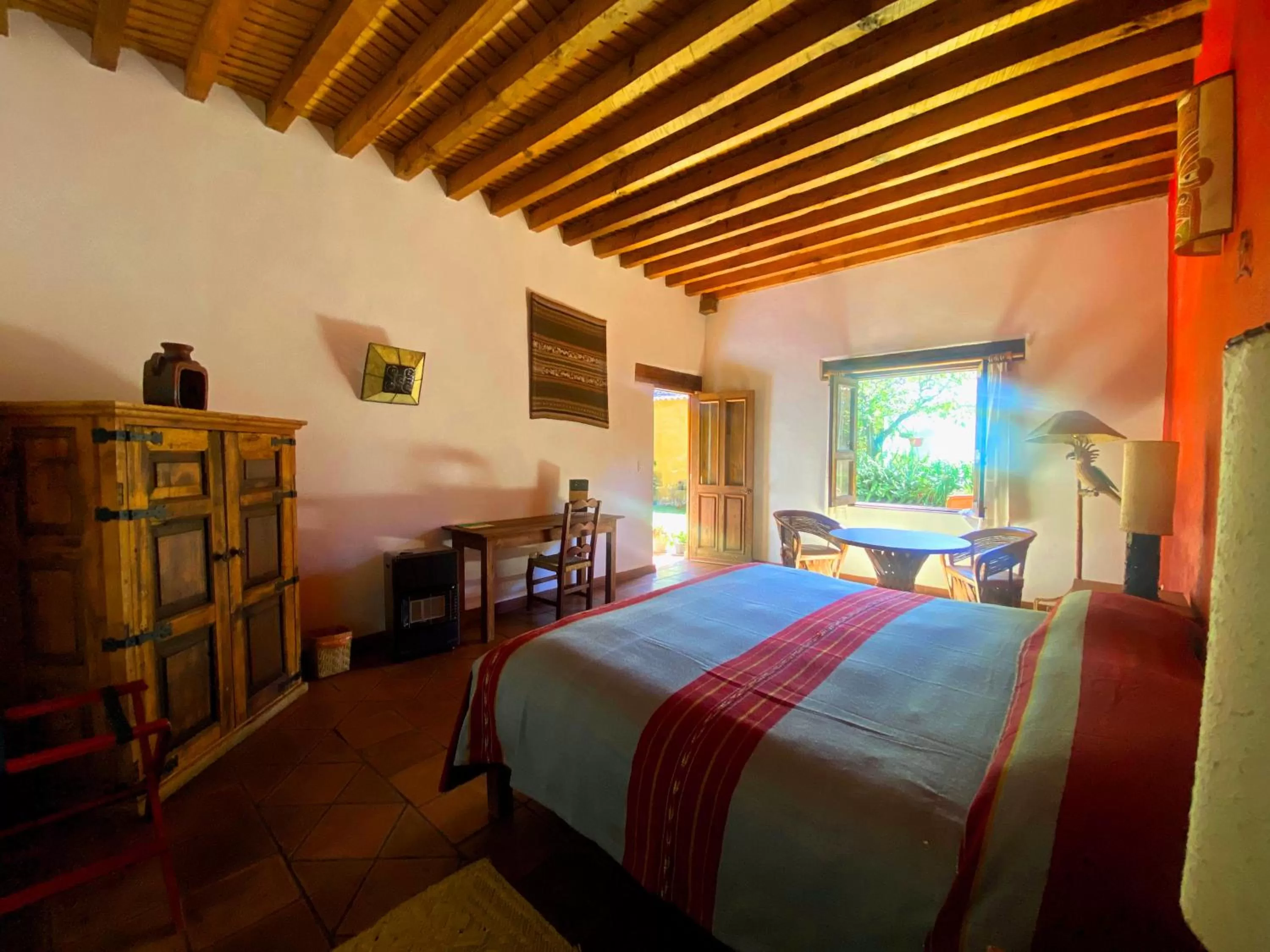 Photo of the whole room, Bed in Posada Yolihuani