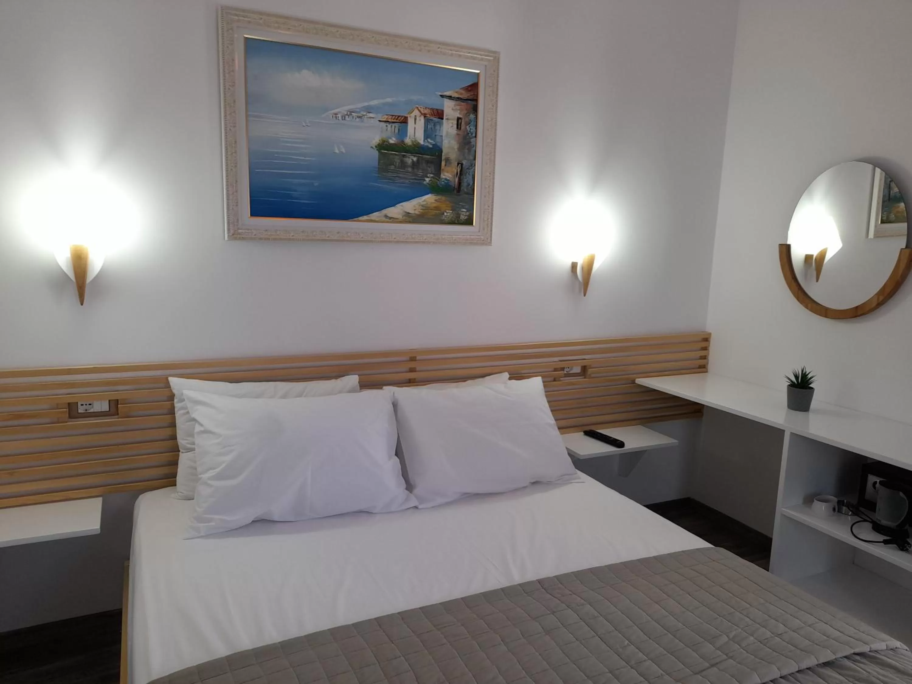 Bed in Anxhelos Hotel