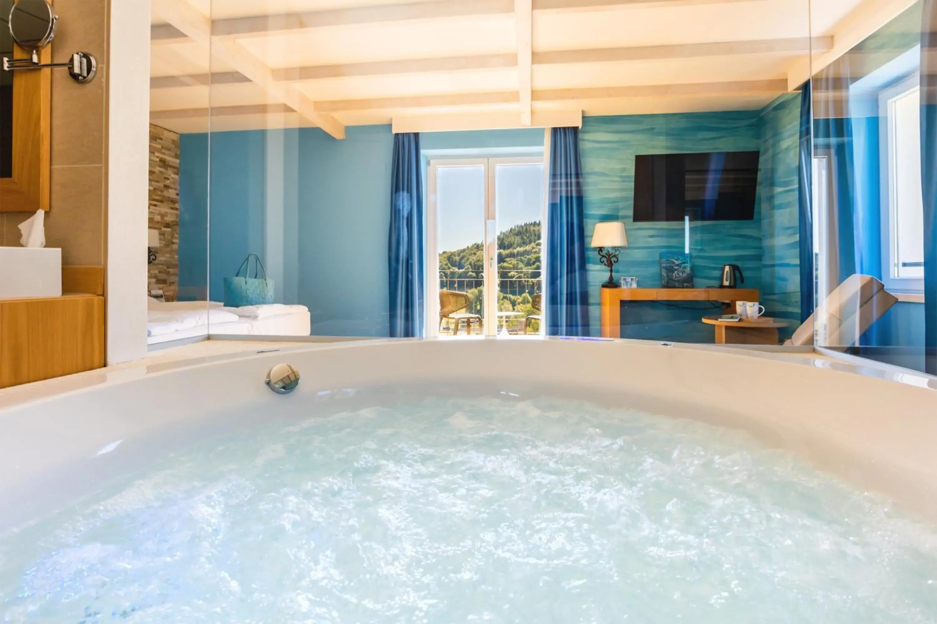 Deluxe Suite with Hot Tub - single occupancy in Kurhaus Cademario Hotel & SPA - Adults Only Deluxe Suite with Hot Tub - single occupancy in Kurhaus Cademario Hotel & SPA - Adults Only
