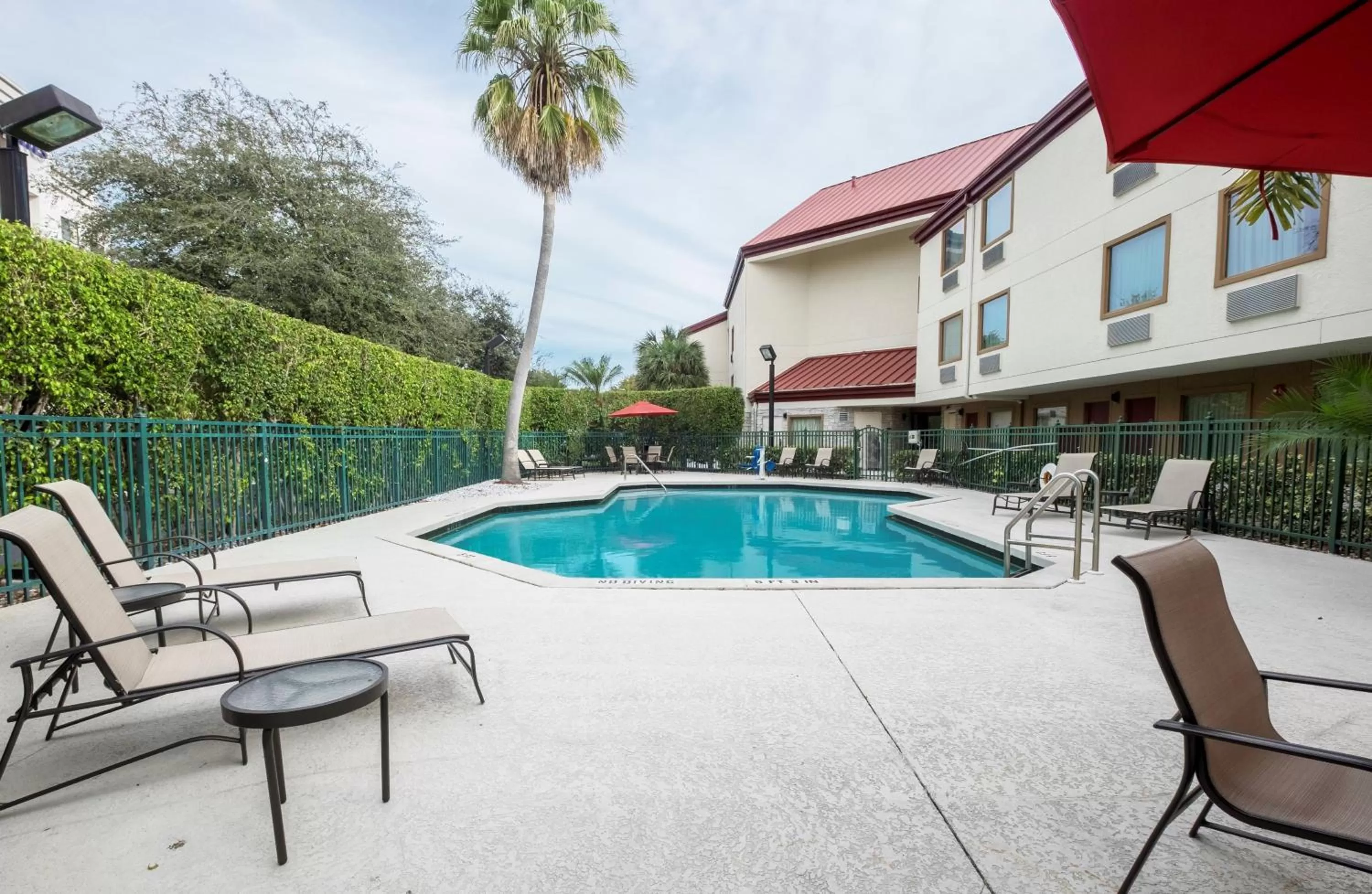 Swimming pool in Red Roof Inn PLUS+ West Palm Beach