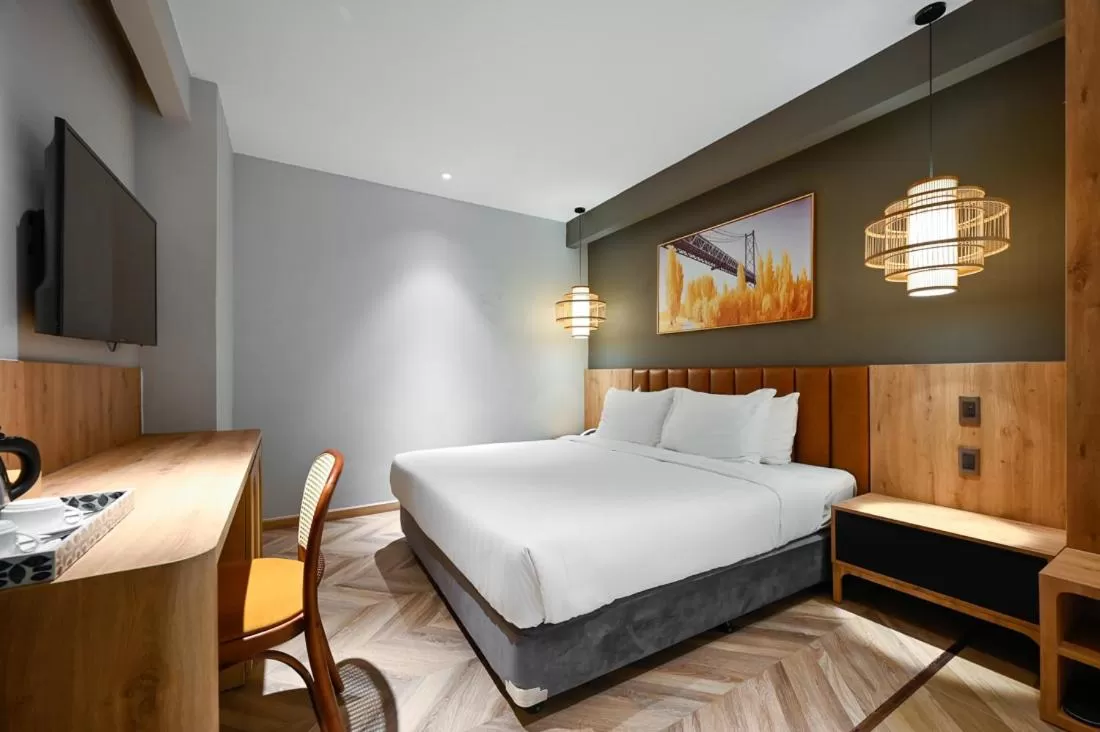 Bed in La Opera Saigon Hotel