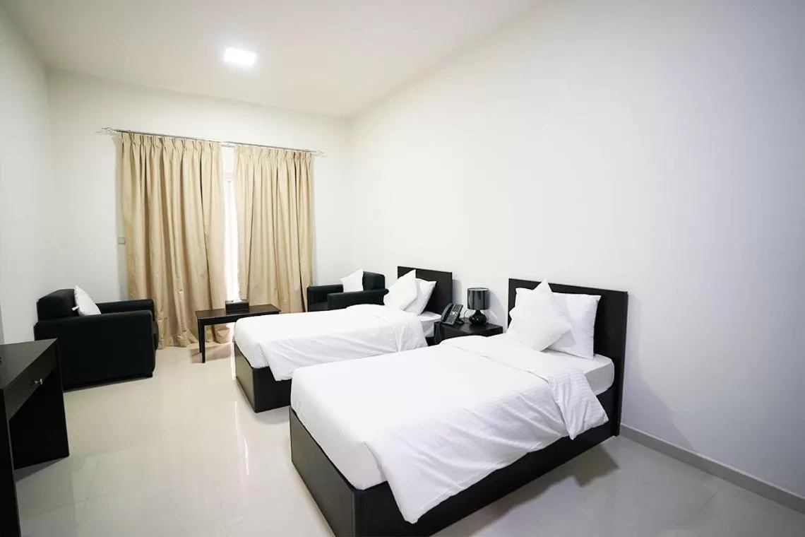 Bed in Aurak Guest House