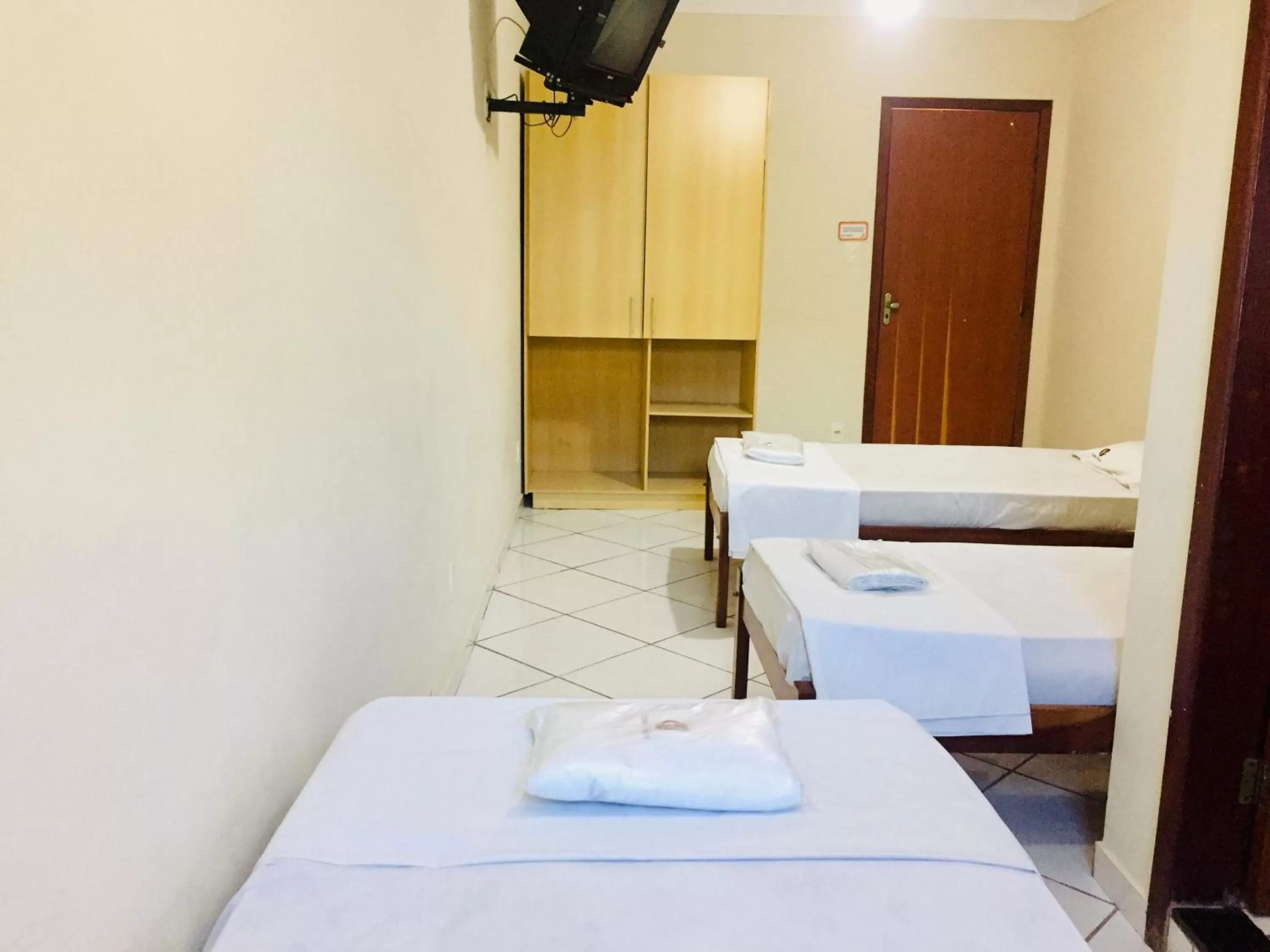 Bed in Hotel Oliveira