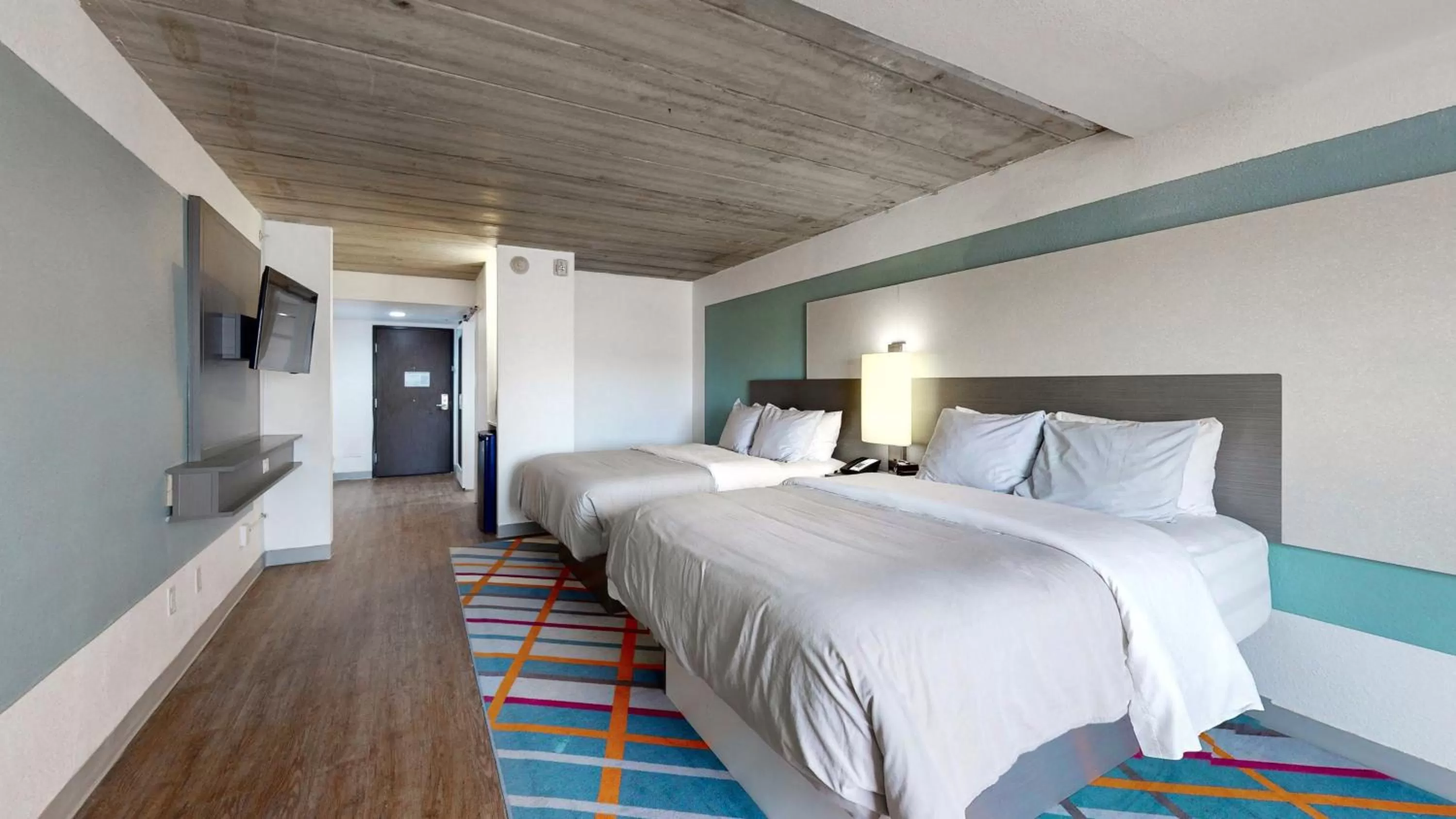 Bedroom, Bed in voco College Station Aggieland by IHG