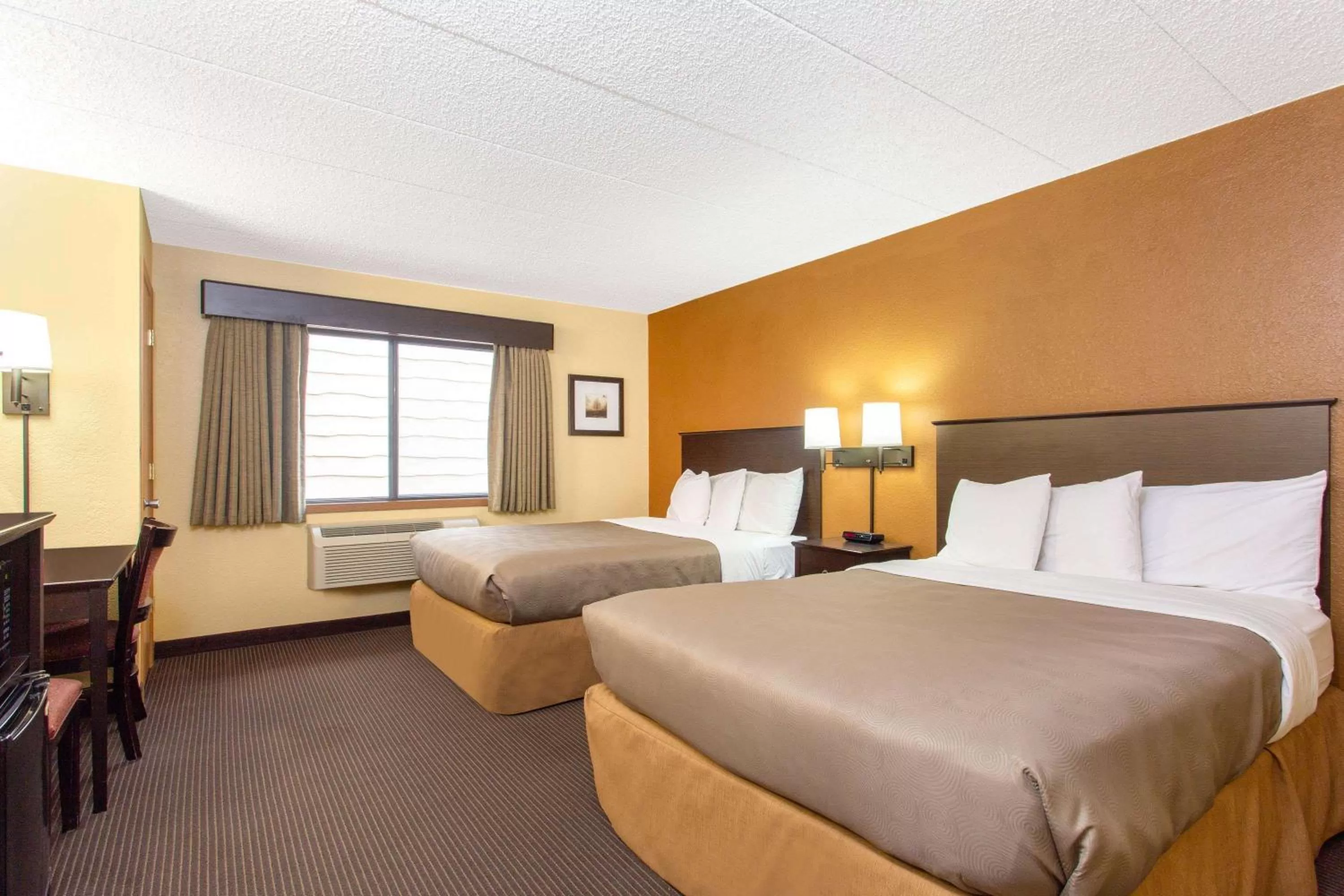 Photo of the whole room, Bed in AmericInn by Wyndham West Bend
