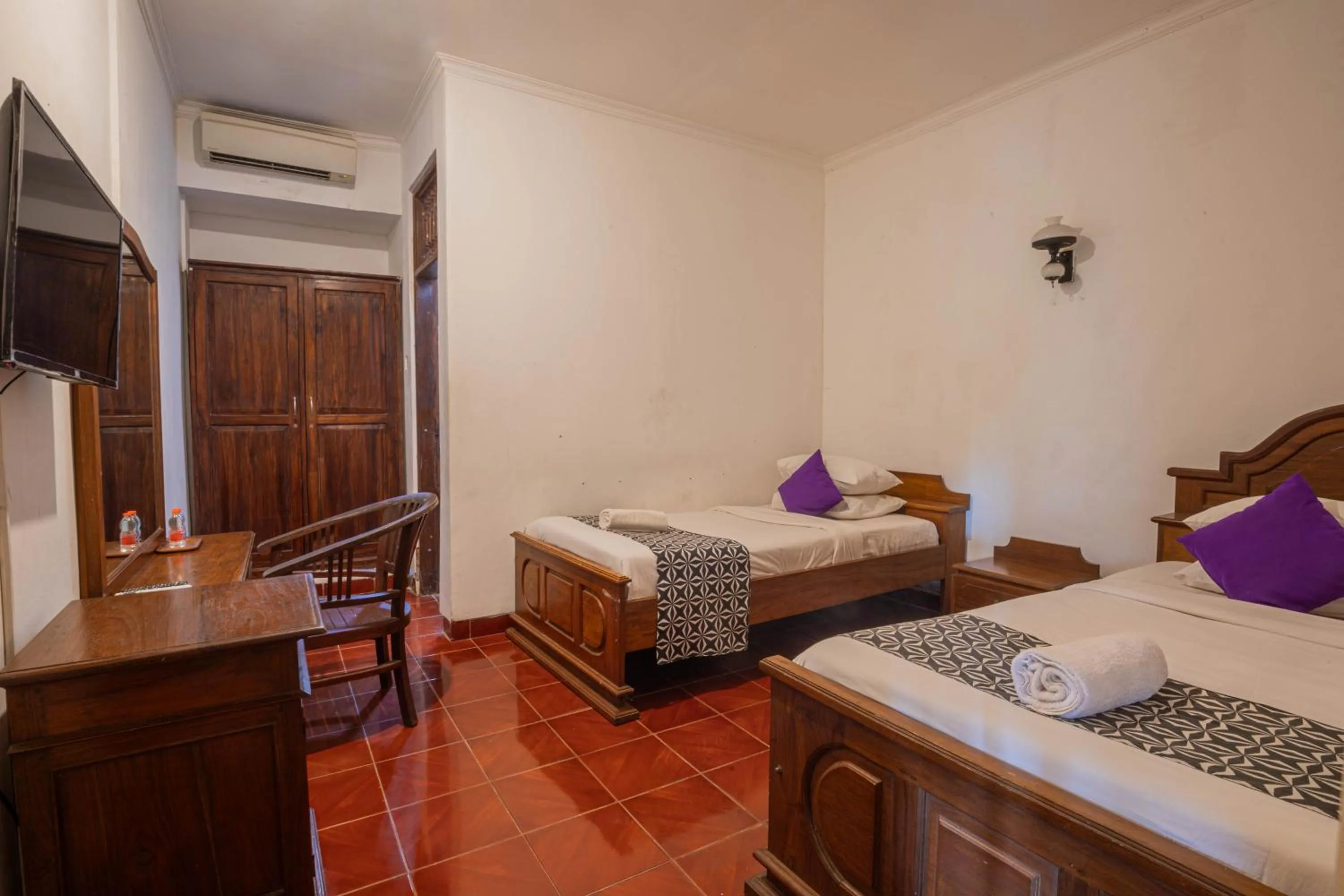 Bedroom in Puri Mango Guest House Sanur