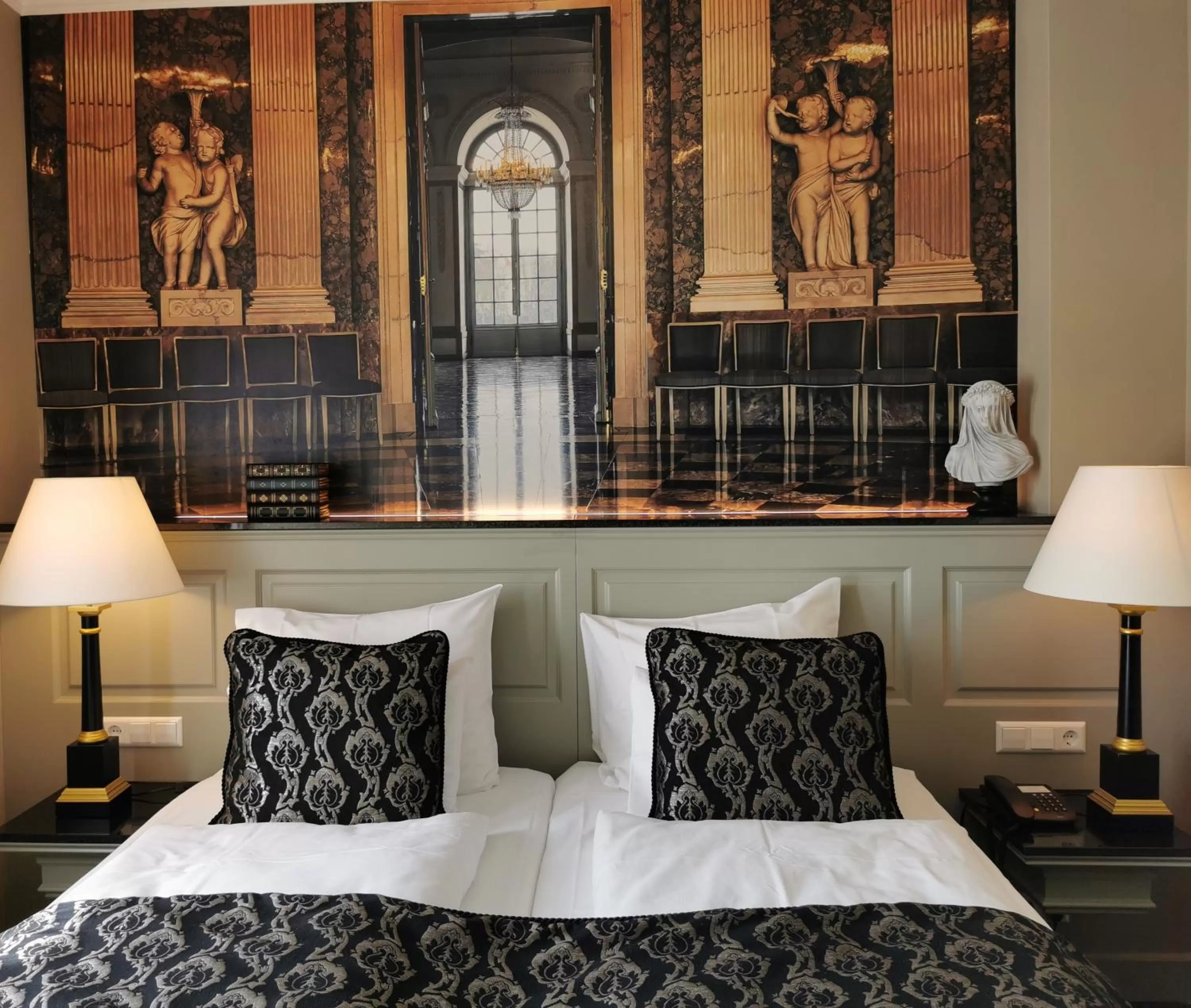 Bed in Apollofirst Boutique Hotel