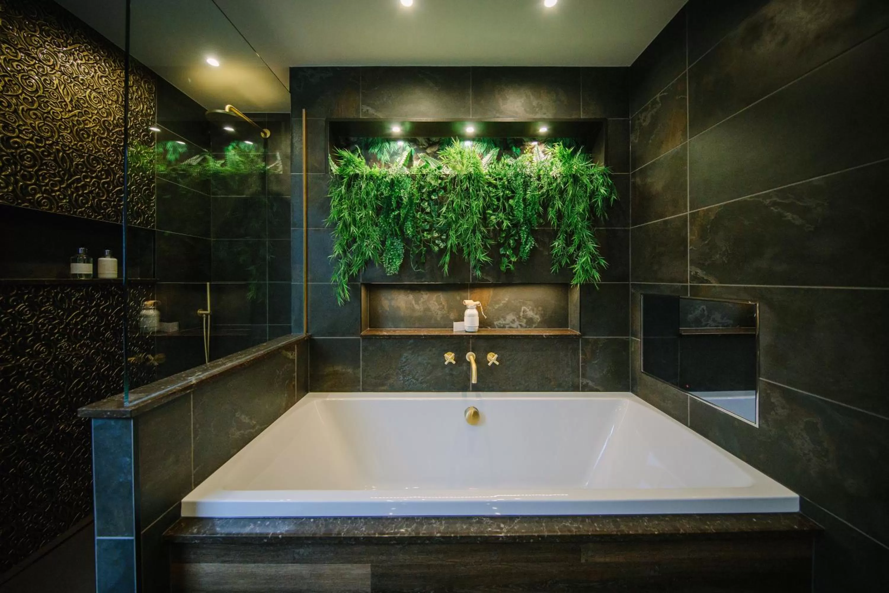 Bathroom in Absoluxe Suites