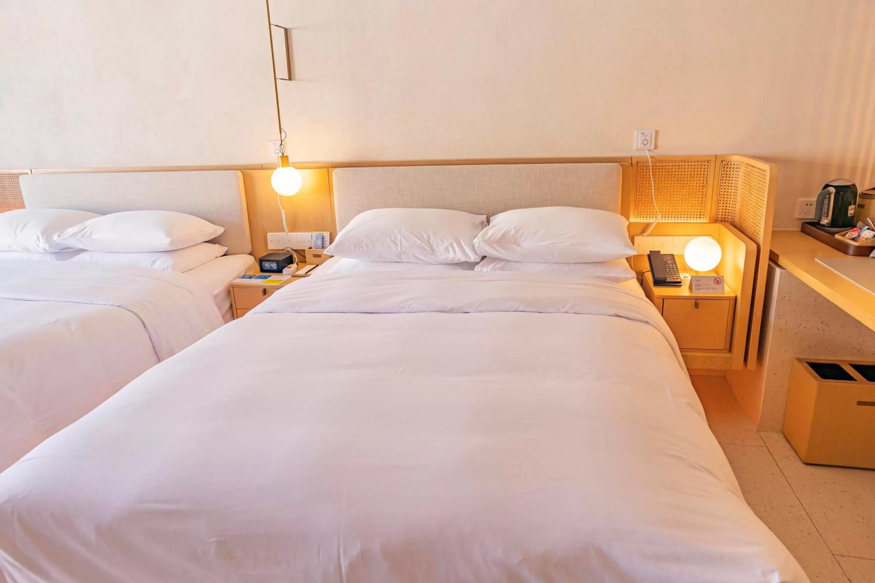 Bedroom, Bed in The Taikang Sanya, a Tribute Portfolio Resort