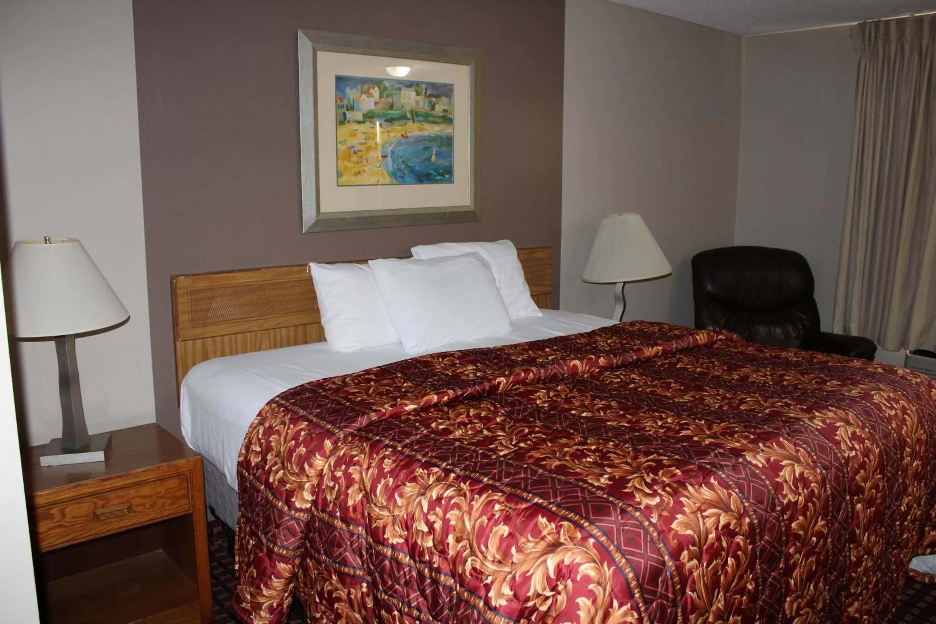 Bedroom, Bed in Coratel Inn and Suites Maple Grove