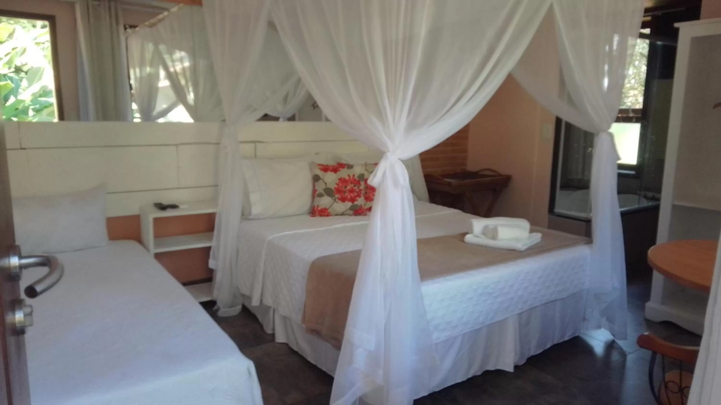 Bed in Magias de Paraty Ecopousada