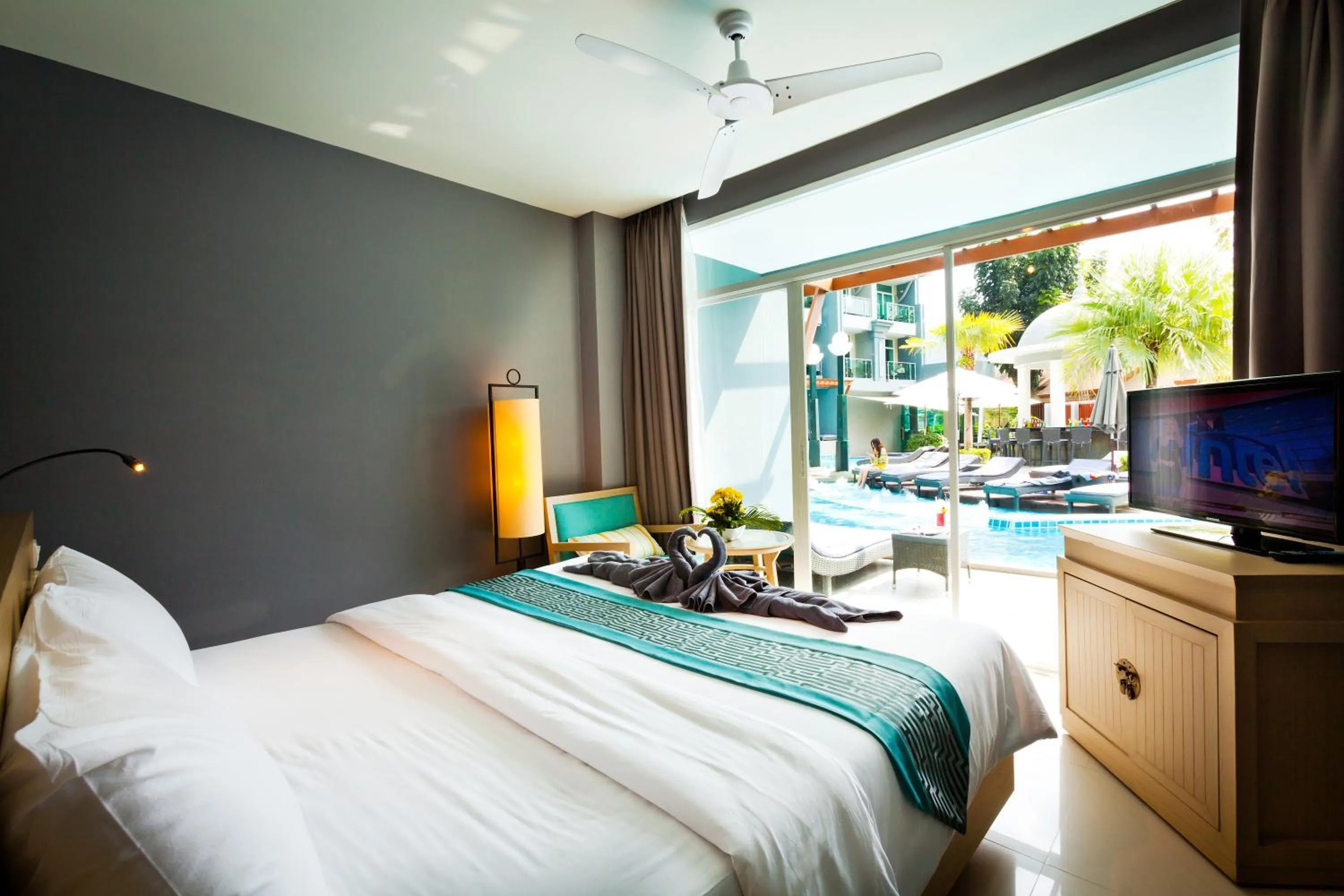 Photo of the whole room, Bed in Ramaburin Resort Patong - SHA Extra Plus