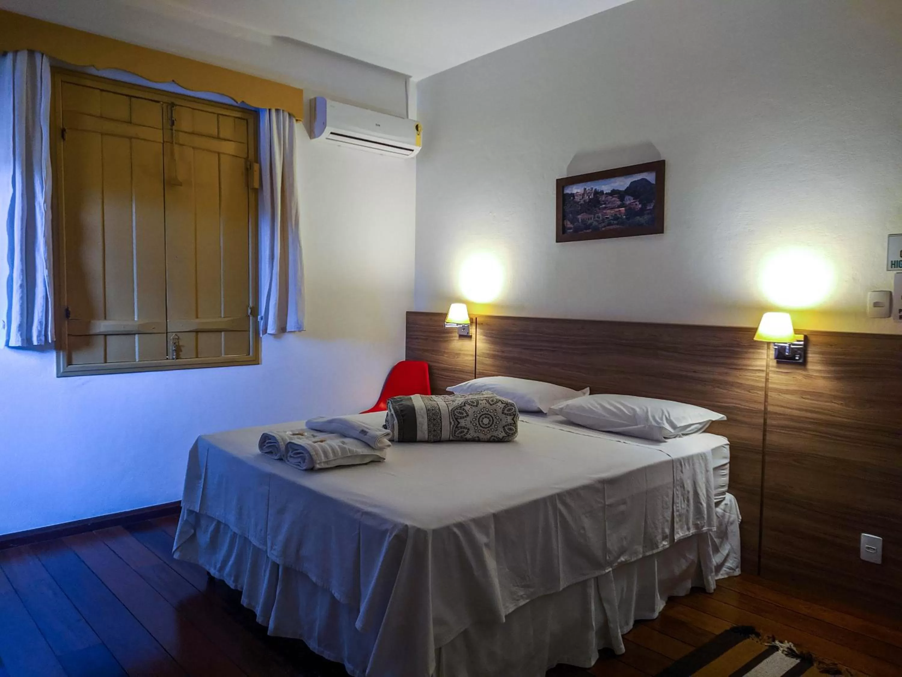 Bed in Pousada o Amanhecer