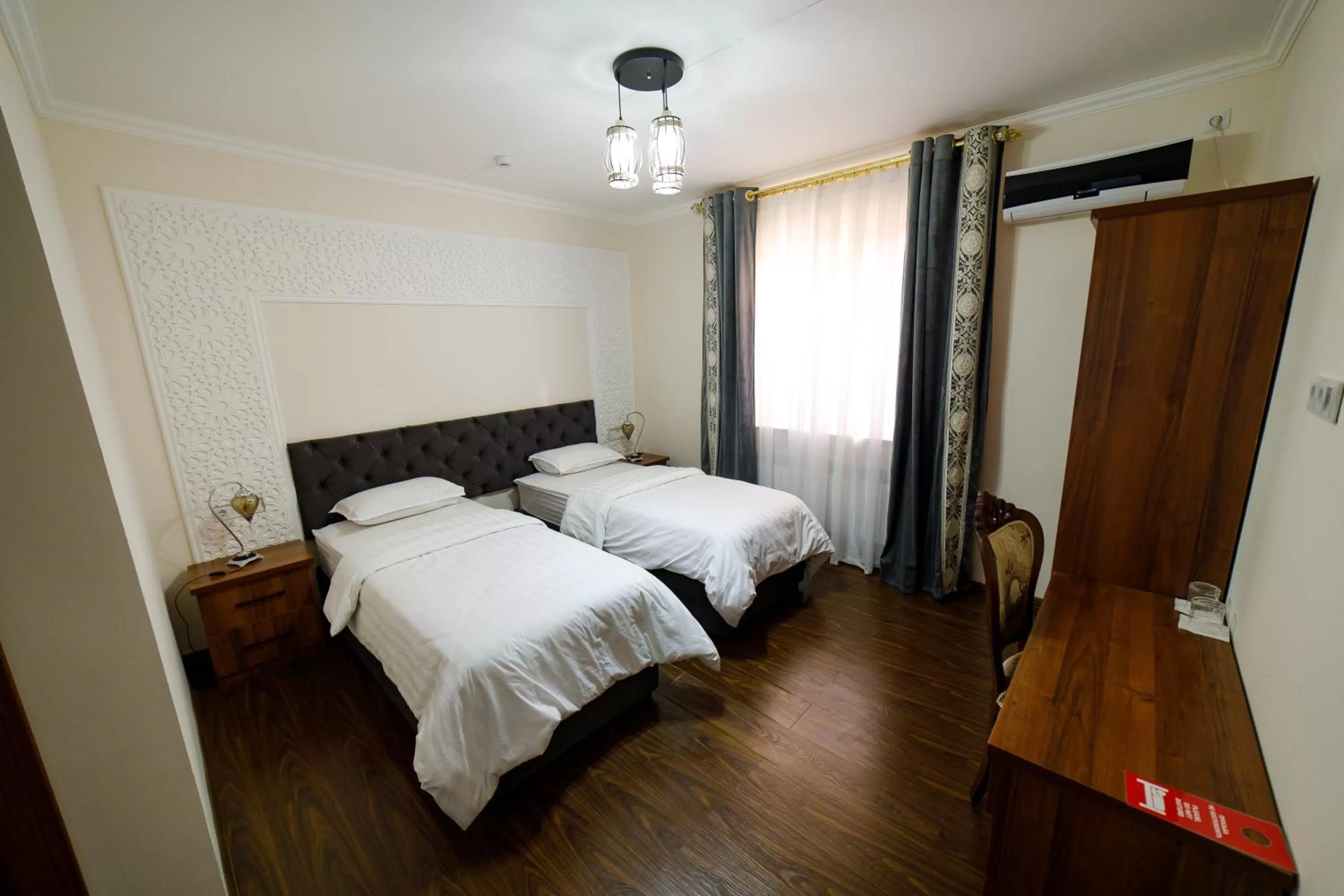 Bed in Khans Palace Hotel