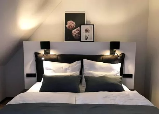 Bed in Hotel Maribor & Garden Rooms