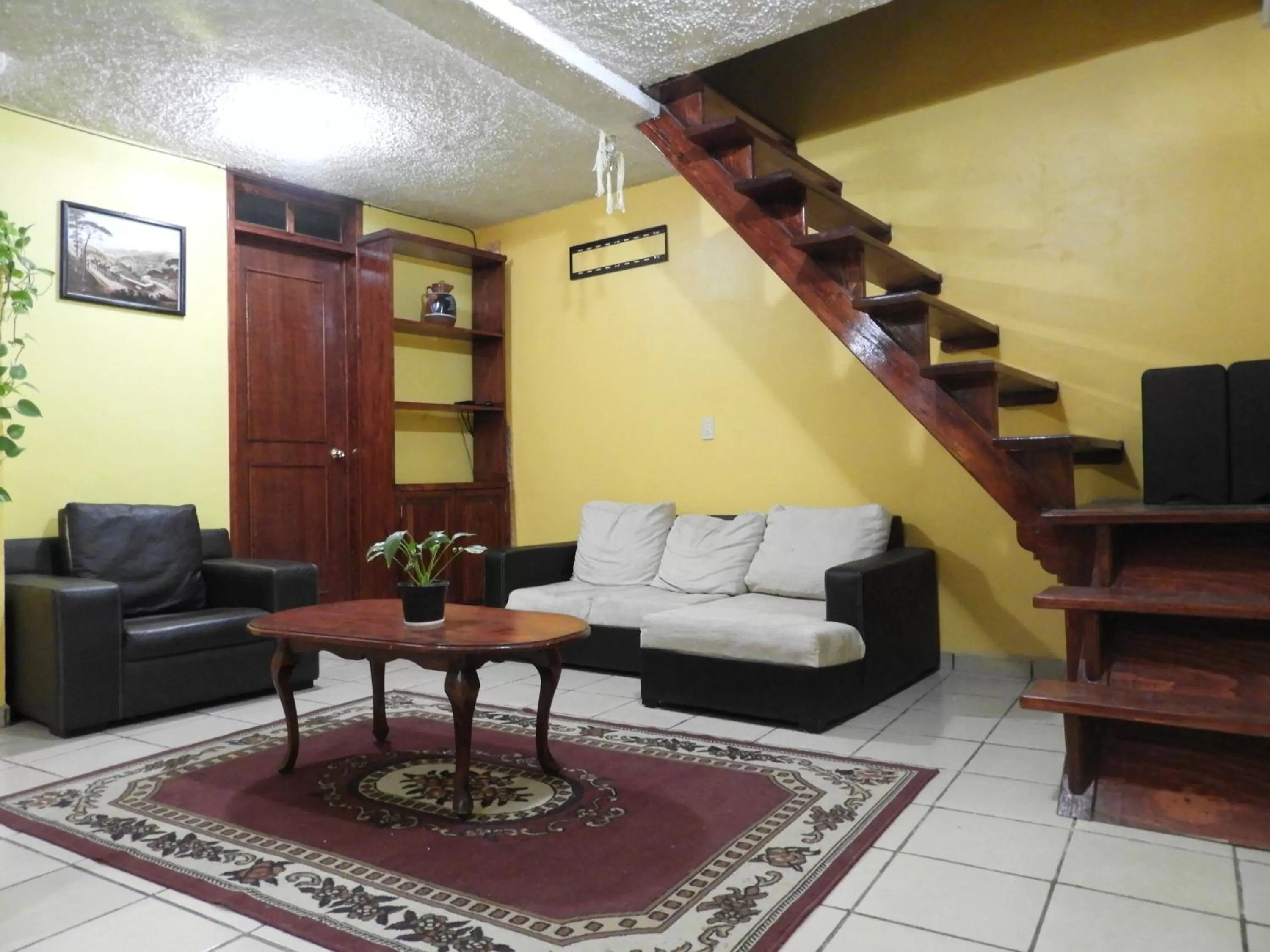 Communal lounge/ TV room in La Lotería Panoramic House & Rooftop by Lunian