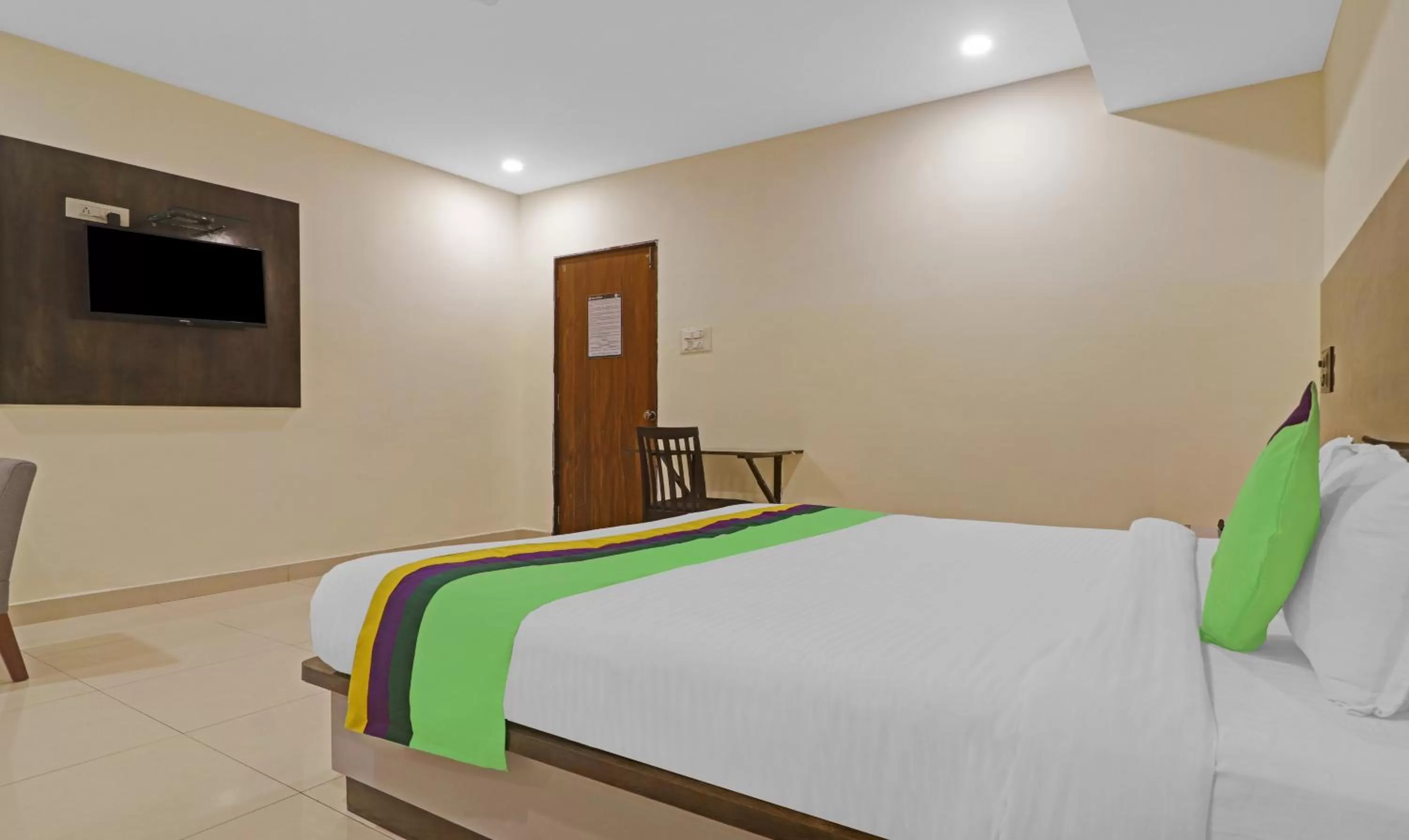 Bedroom, Bed in Treebo Trend Tee