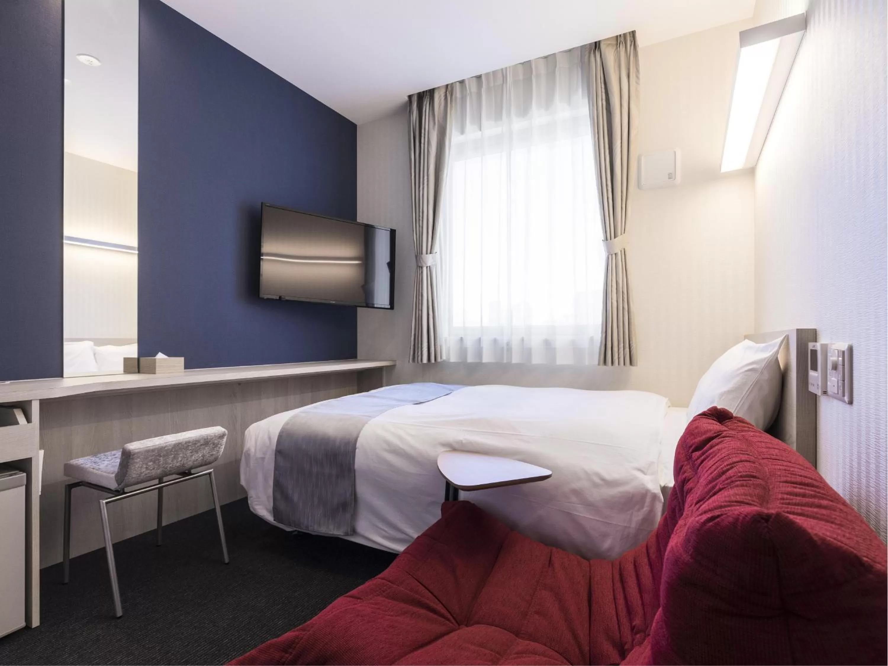 Bed in Hotel Wing International Hakata Shinkansenguchi