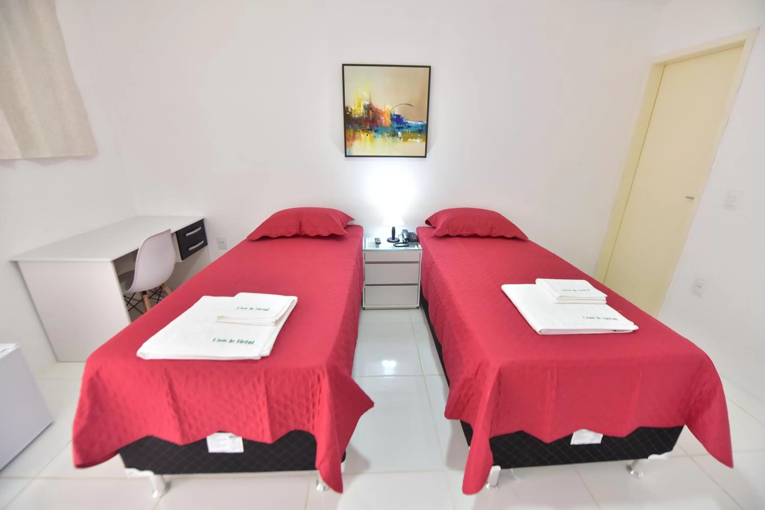 Bed in LIVE IN FORTALEZA HOTEL