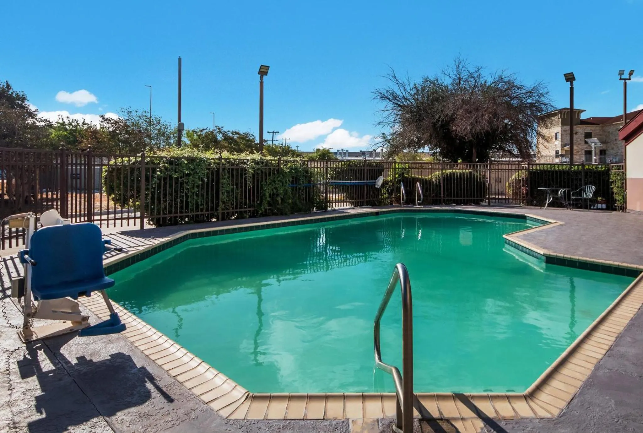 Swimming pool in HomeTowne Studios by Red Roof San Antonio - SeaWorld Northwest