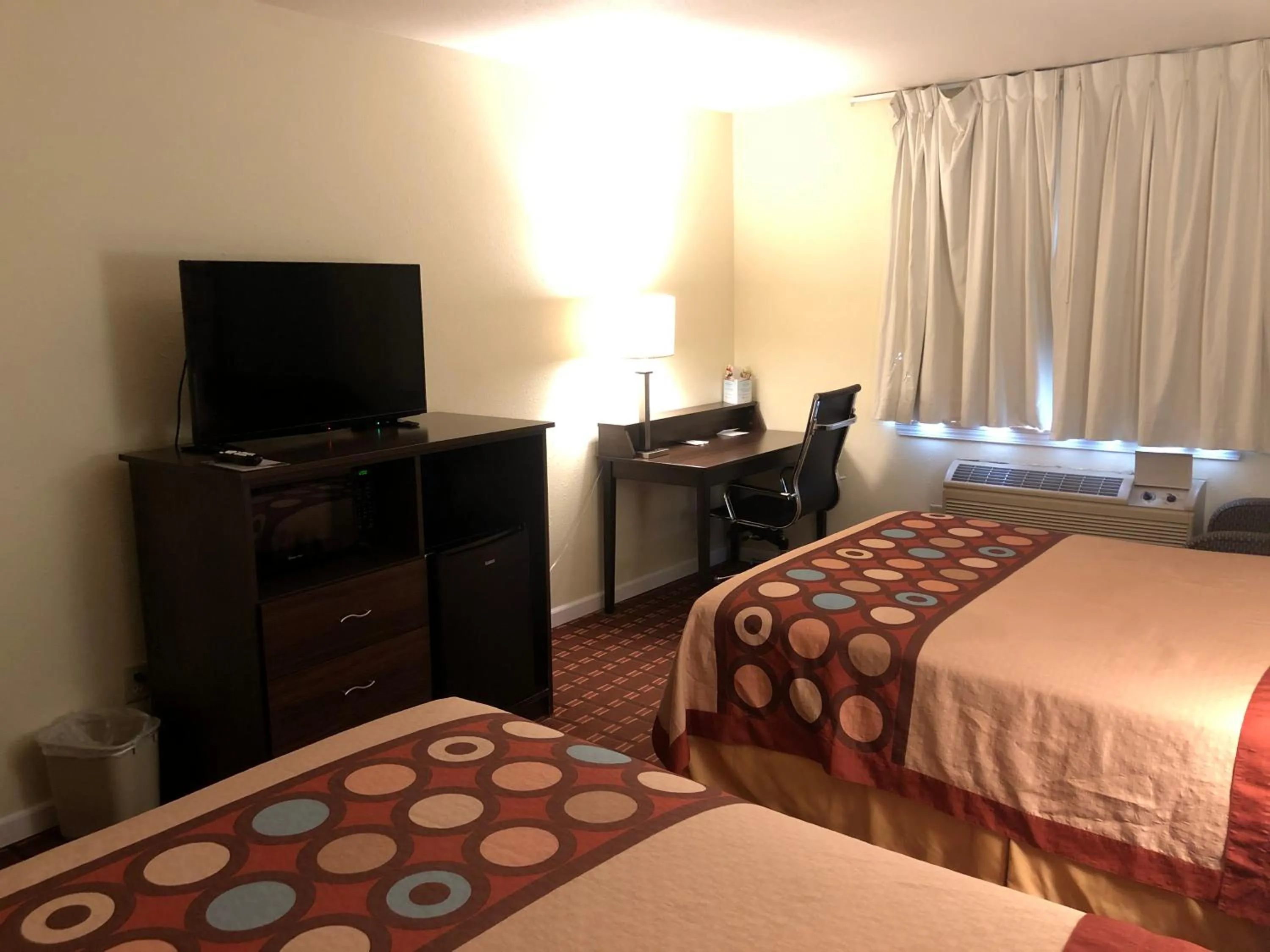 Bed in Super 8 by Wyndham Plover Stevens Point Area