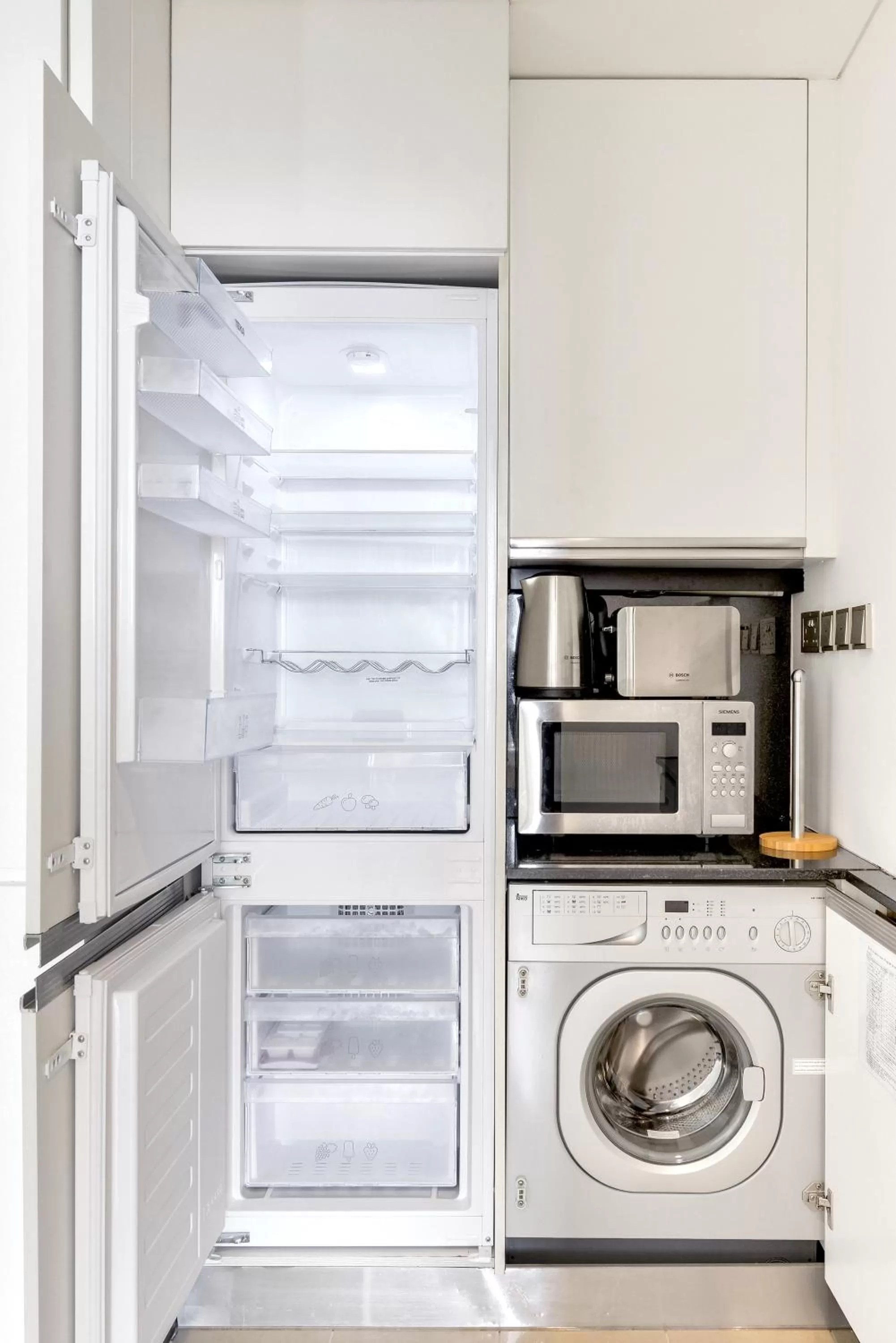 washing machine in Emaar Residences Dubai Marina by Qstay - formerly Address Dubai Marina