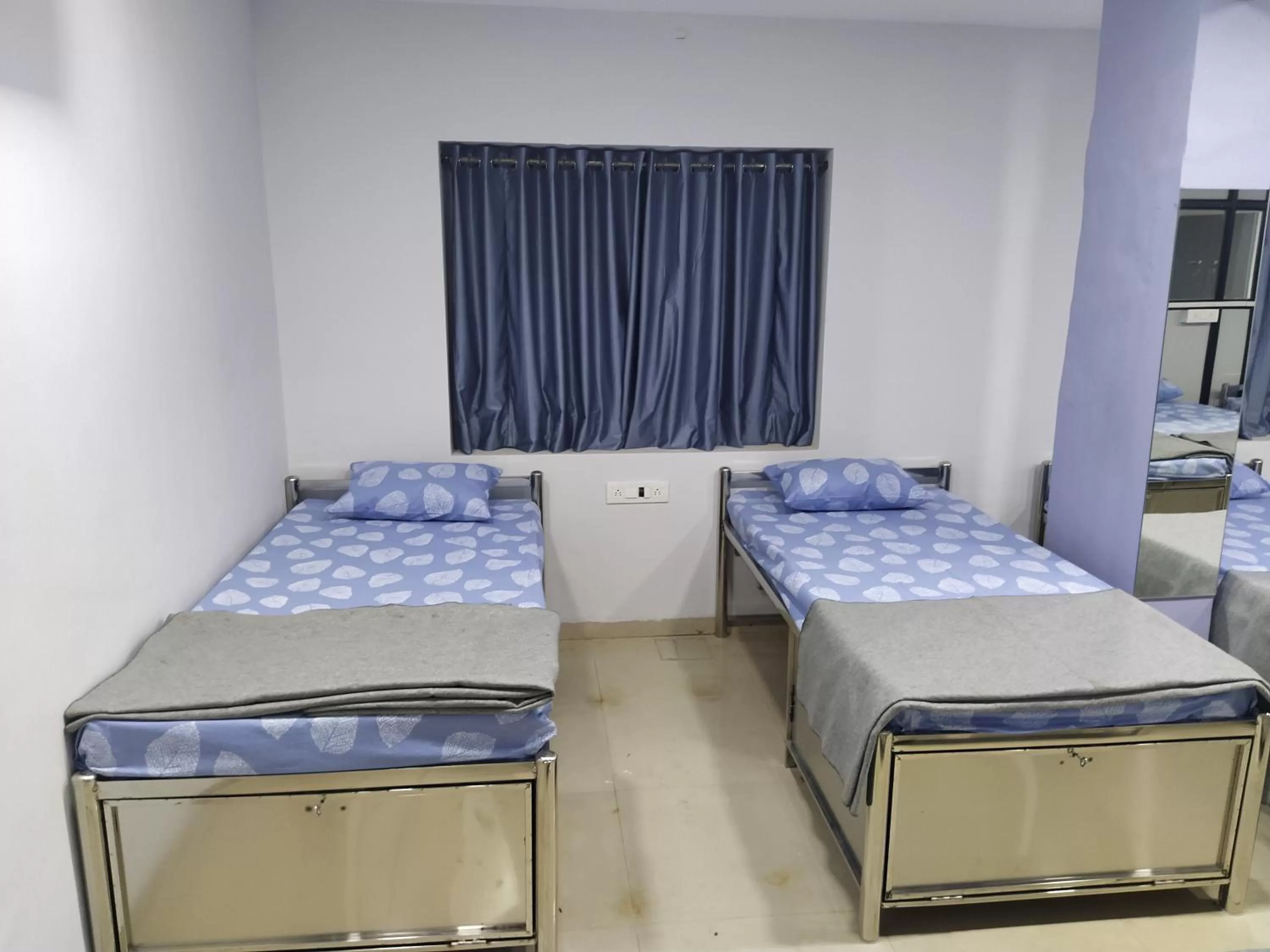 Bed in Shiv Sai Dormitory