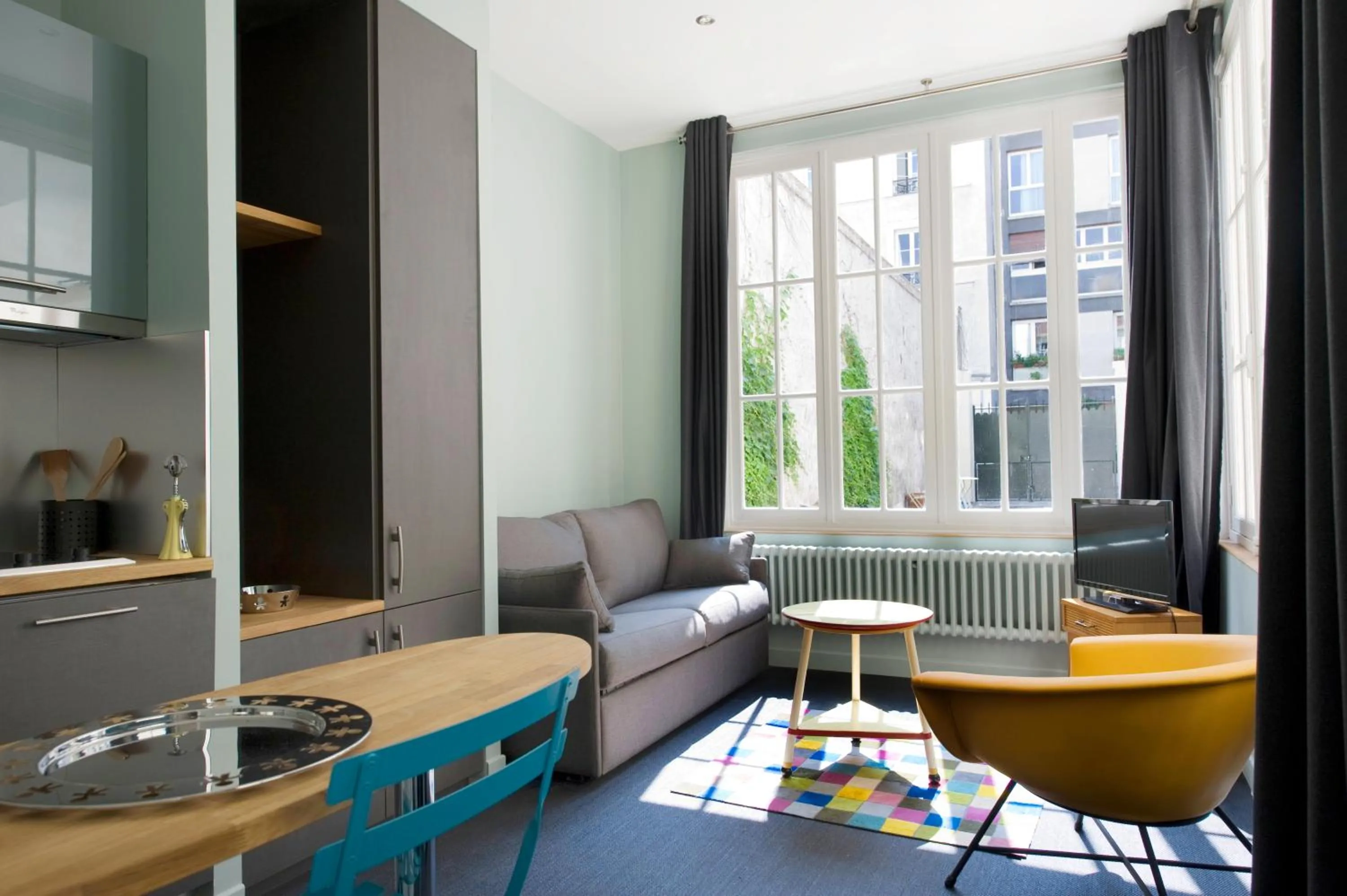 Kitchen or kitchenette in Hôtel Helzear Montparnasse