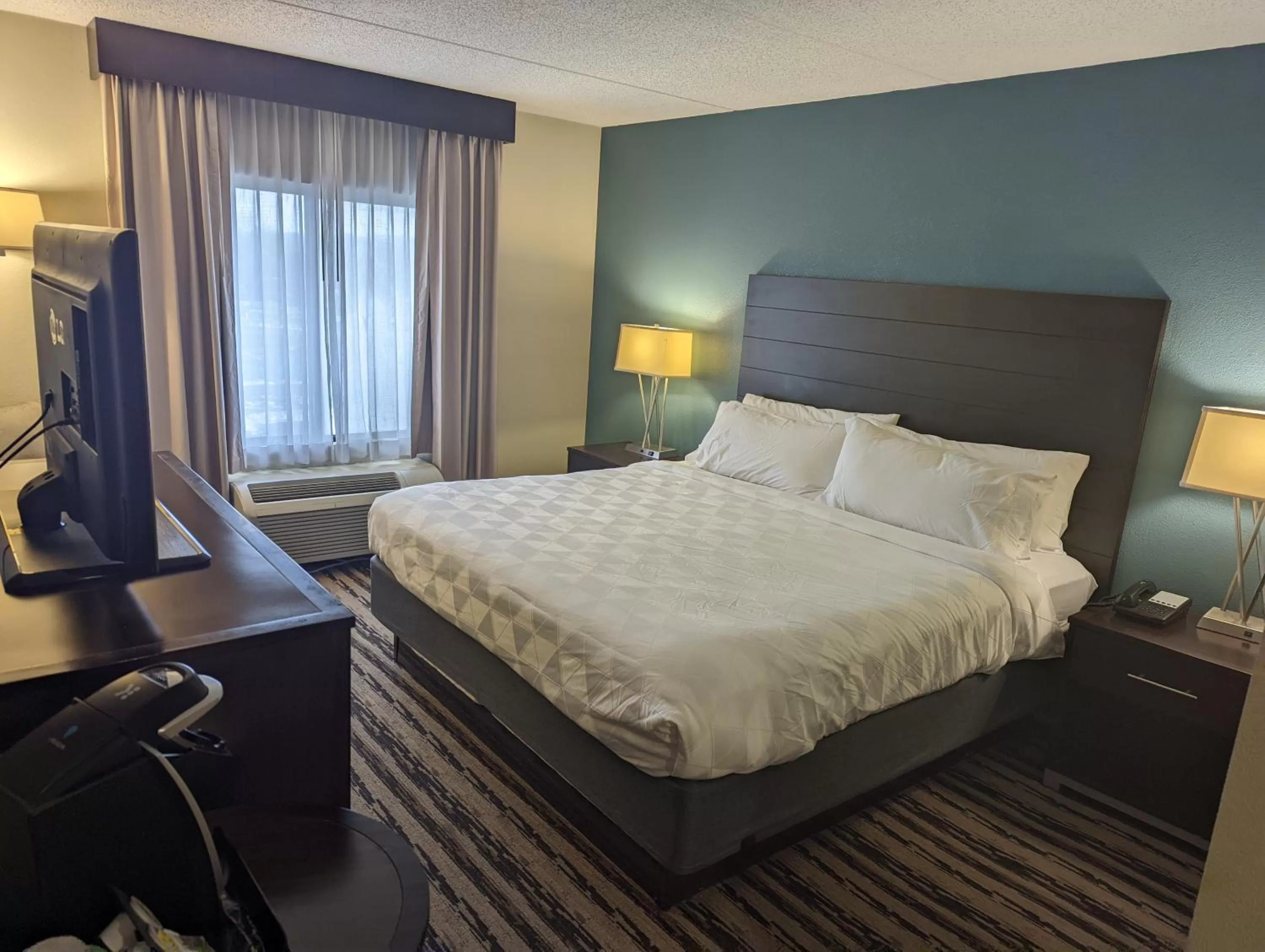 Bedroom in Holiday Inn Harrisburg East by IHG