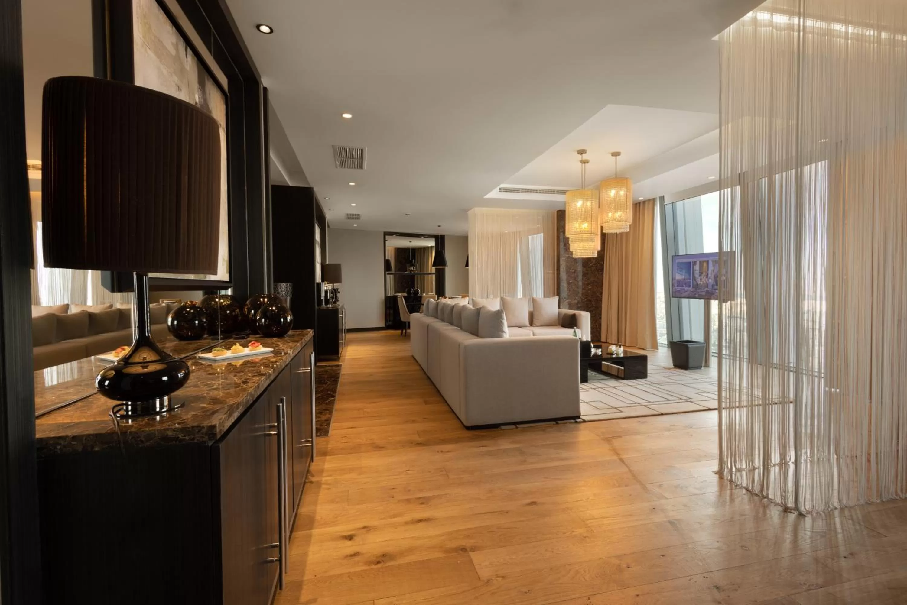 Living room, Bed in Amman Rotana