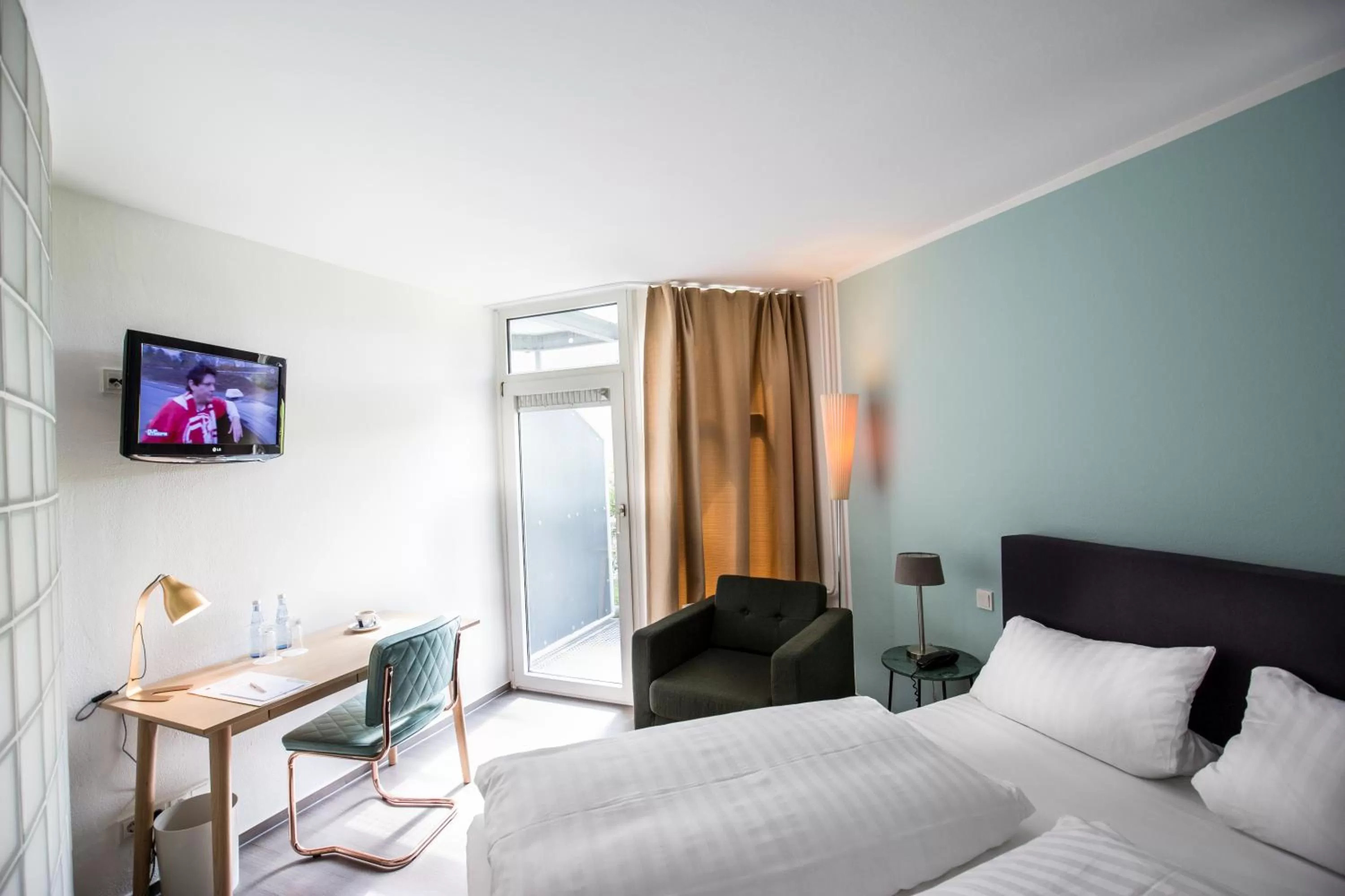 Photo of the whole room, Bed in Wald & Golfhotel Lottental