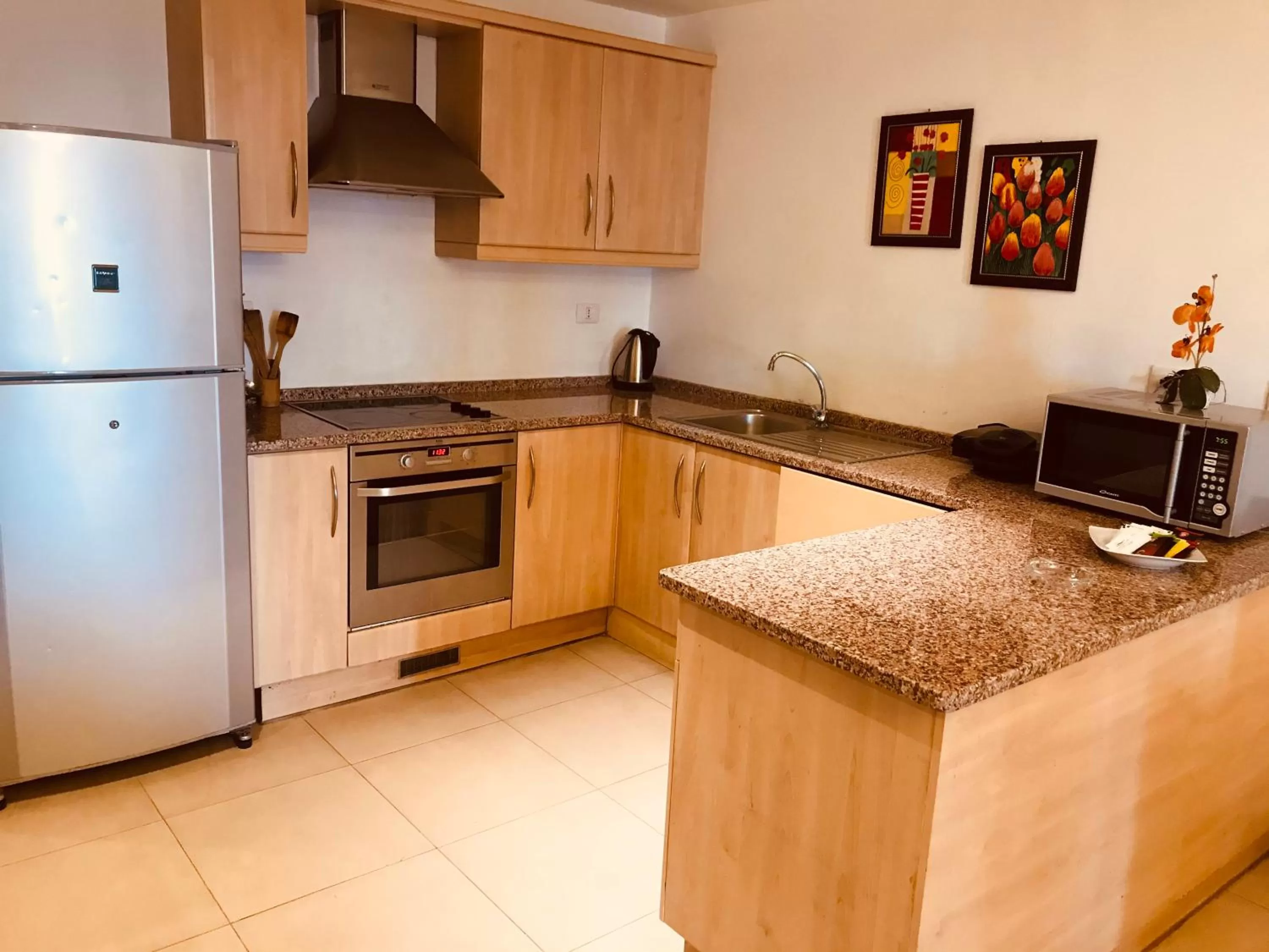 Kitchen or kitchenette in Tala Bay Residence - Families Only