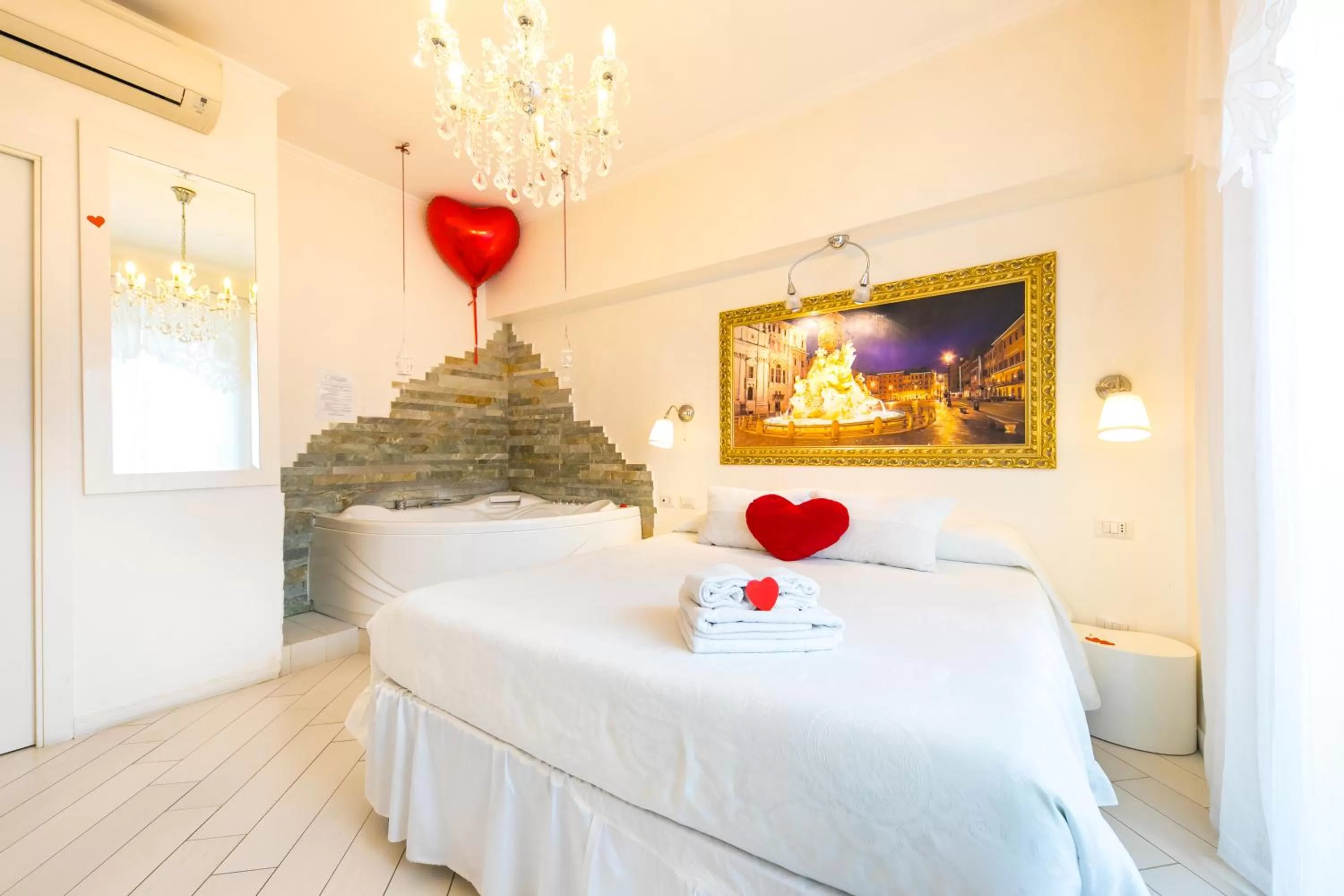 Photo of the whole room, Bed in Suites Roma Tiburtina