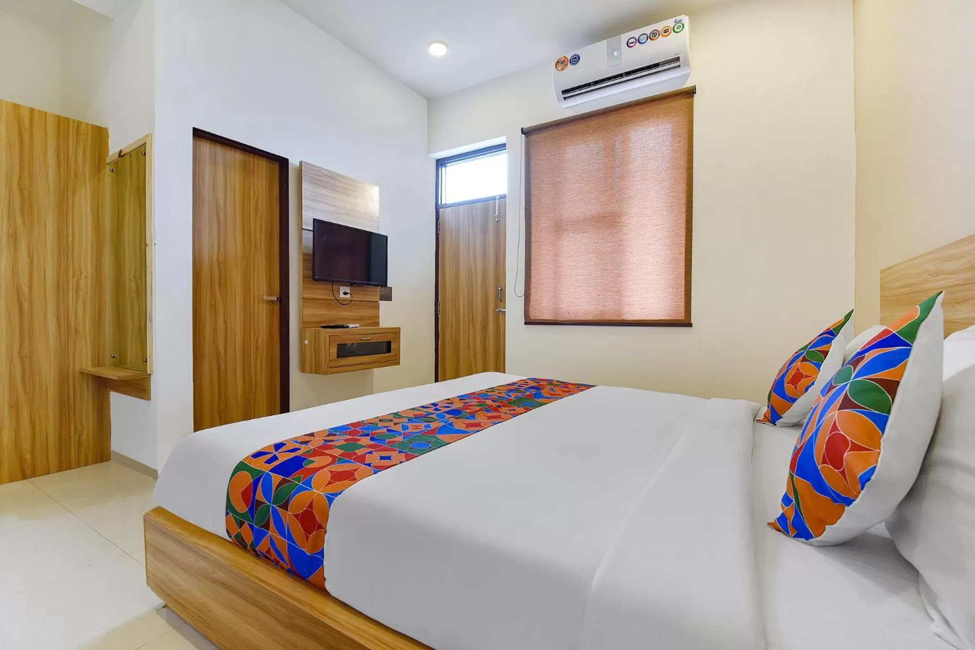 Bed in FabHotel Prime Oxus