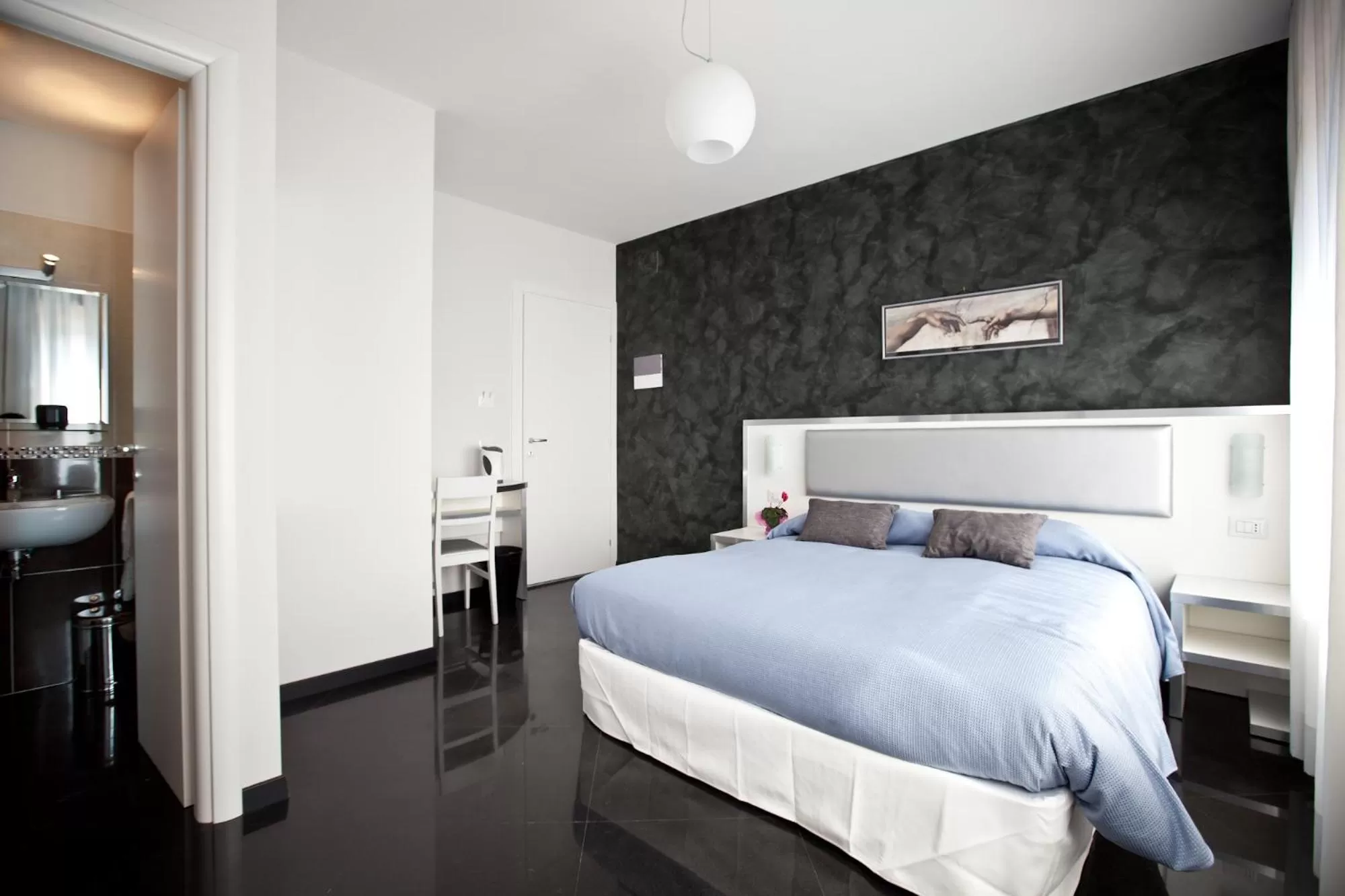 Bed in Heart of Rome Rooms