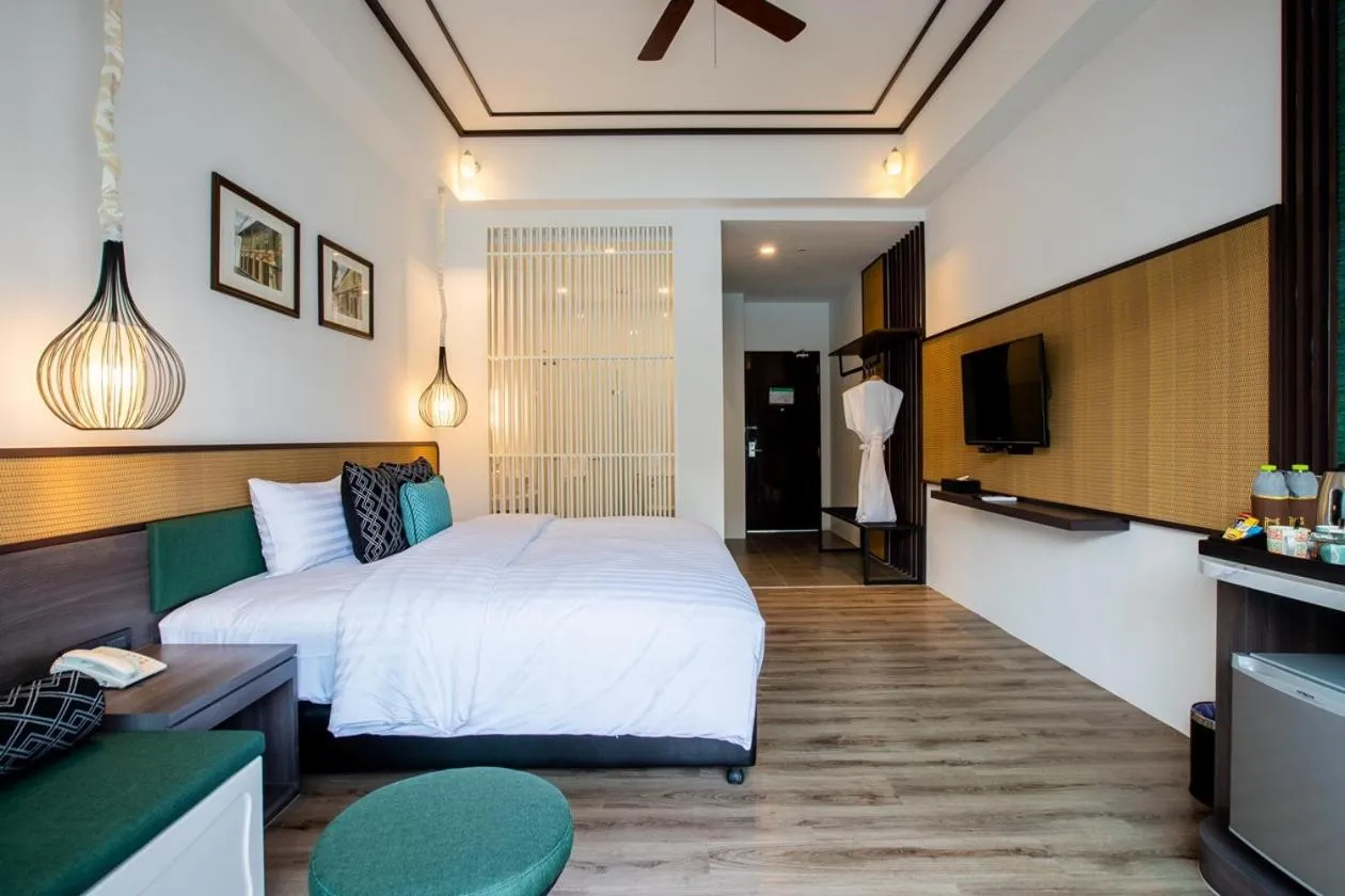 Bed in Chaanburi Boutique Resort