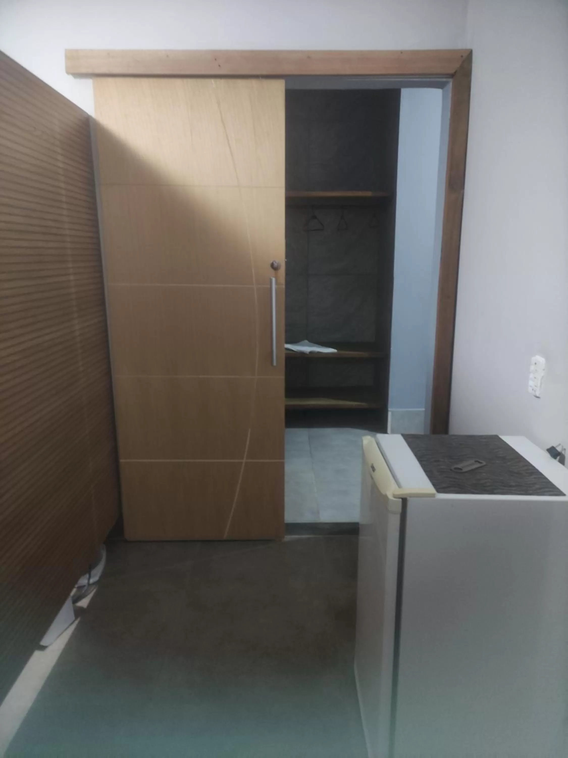 Bathroom in Pousada da Gi Suítes e Turismo