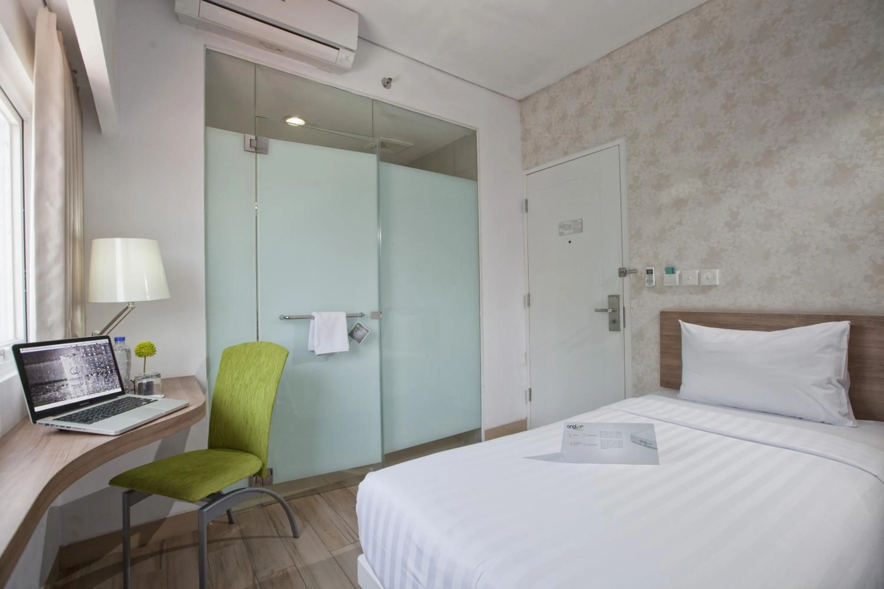 Bathroom, Bed in Whiz Hotel Cikini Jakarta