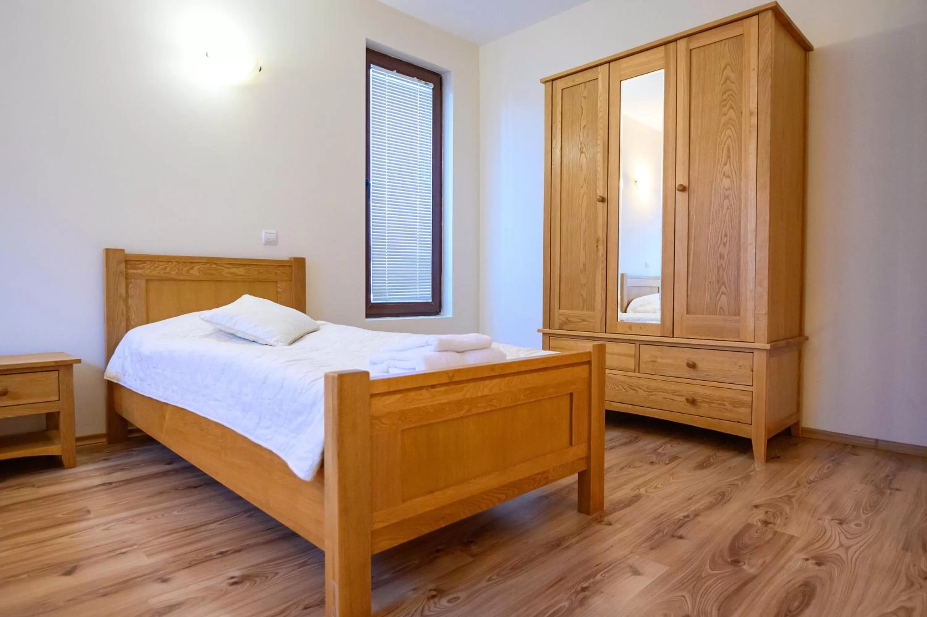 Bed in Parklands Hotel & Pool