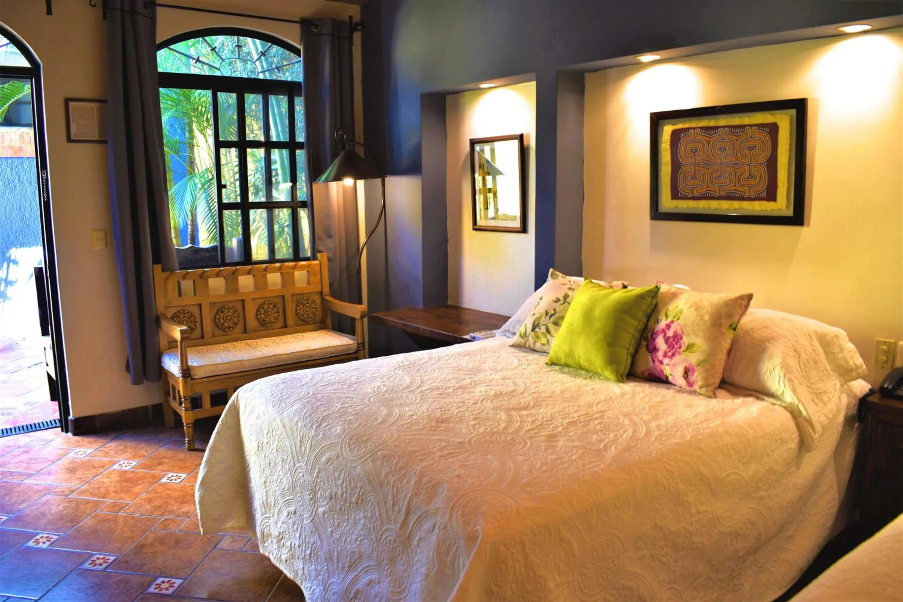Bed in La Villa del Ensueno Boutique Hotel