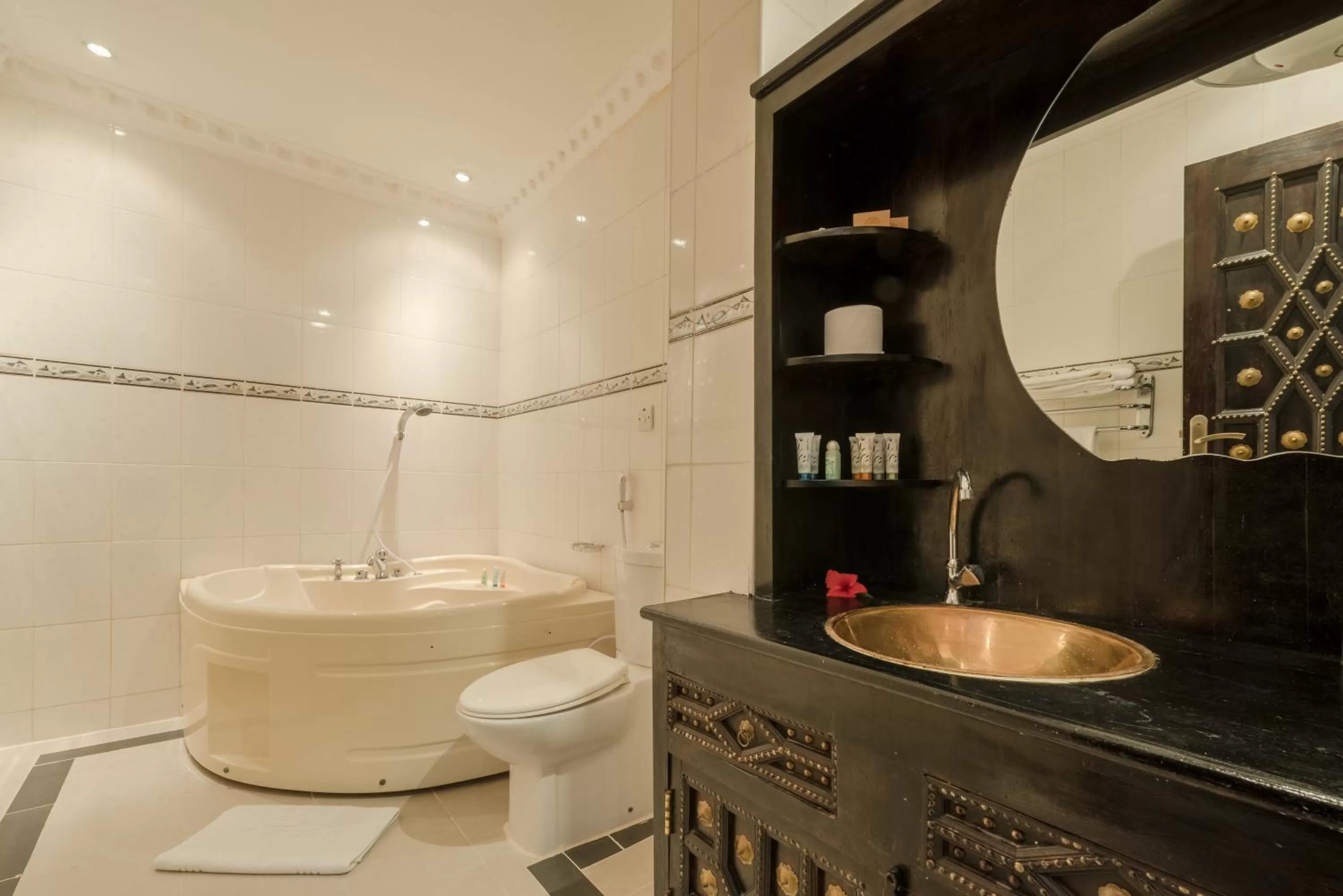 Toilet in Golden Tulip Stone Town Boutique