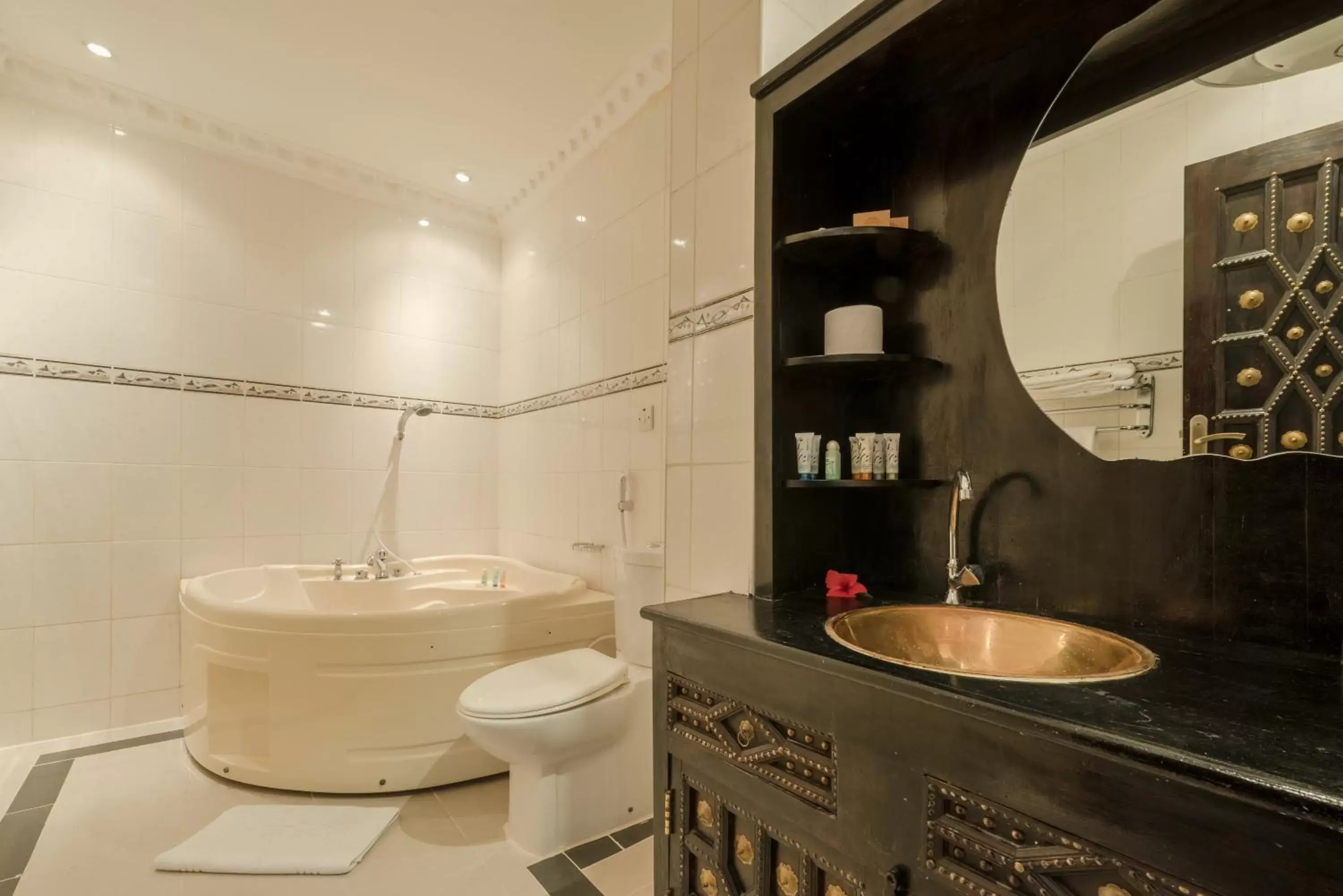 Junior King Suite with Living Room and Jacuzzi in Golden Tulip Stone Town Boutique Junior King Suite with Living Room and Jacuzzi in Golden Tulip Stone Town Boutique