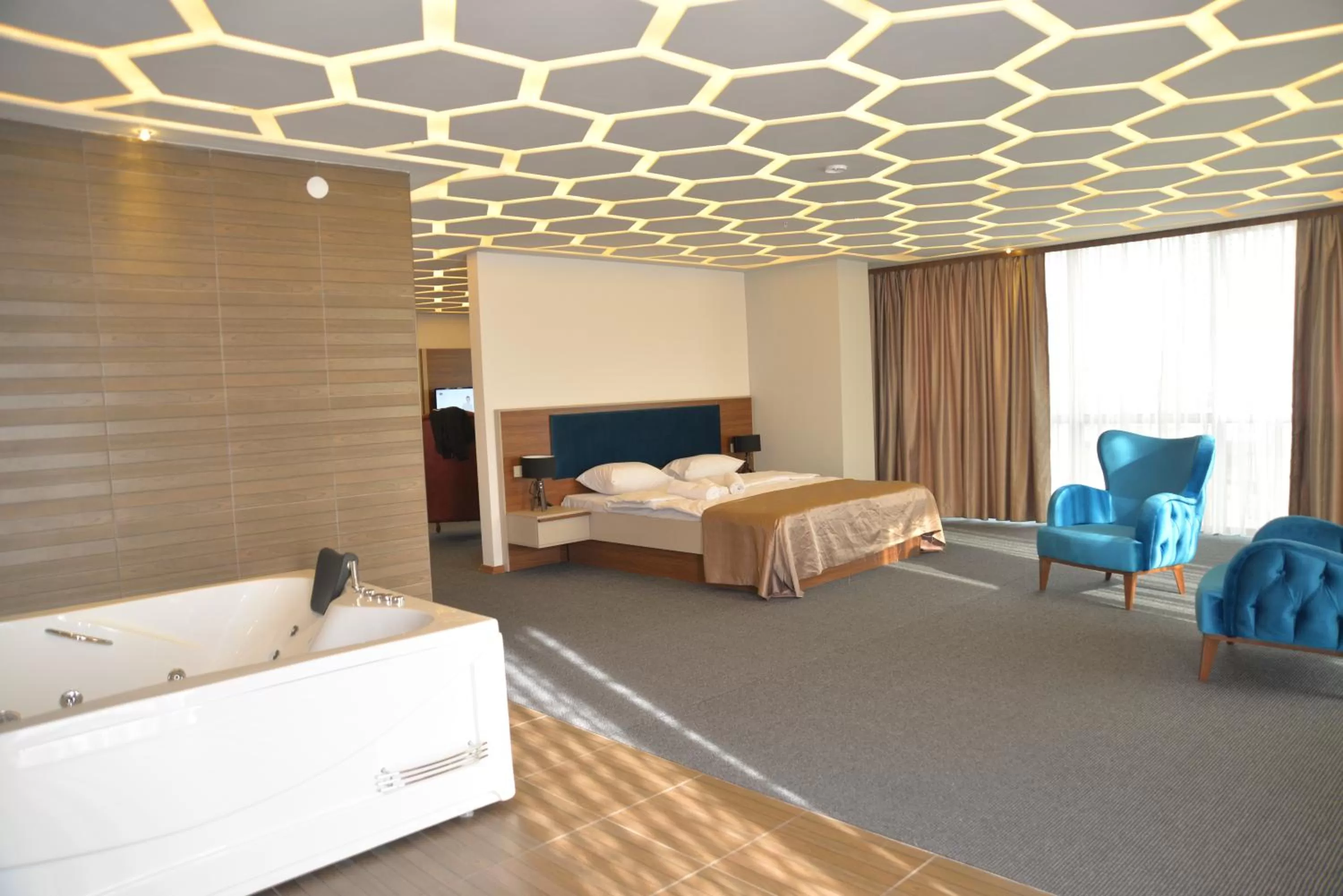 Bed in TEVETOGLU HOTEL