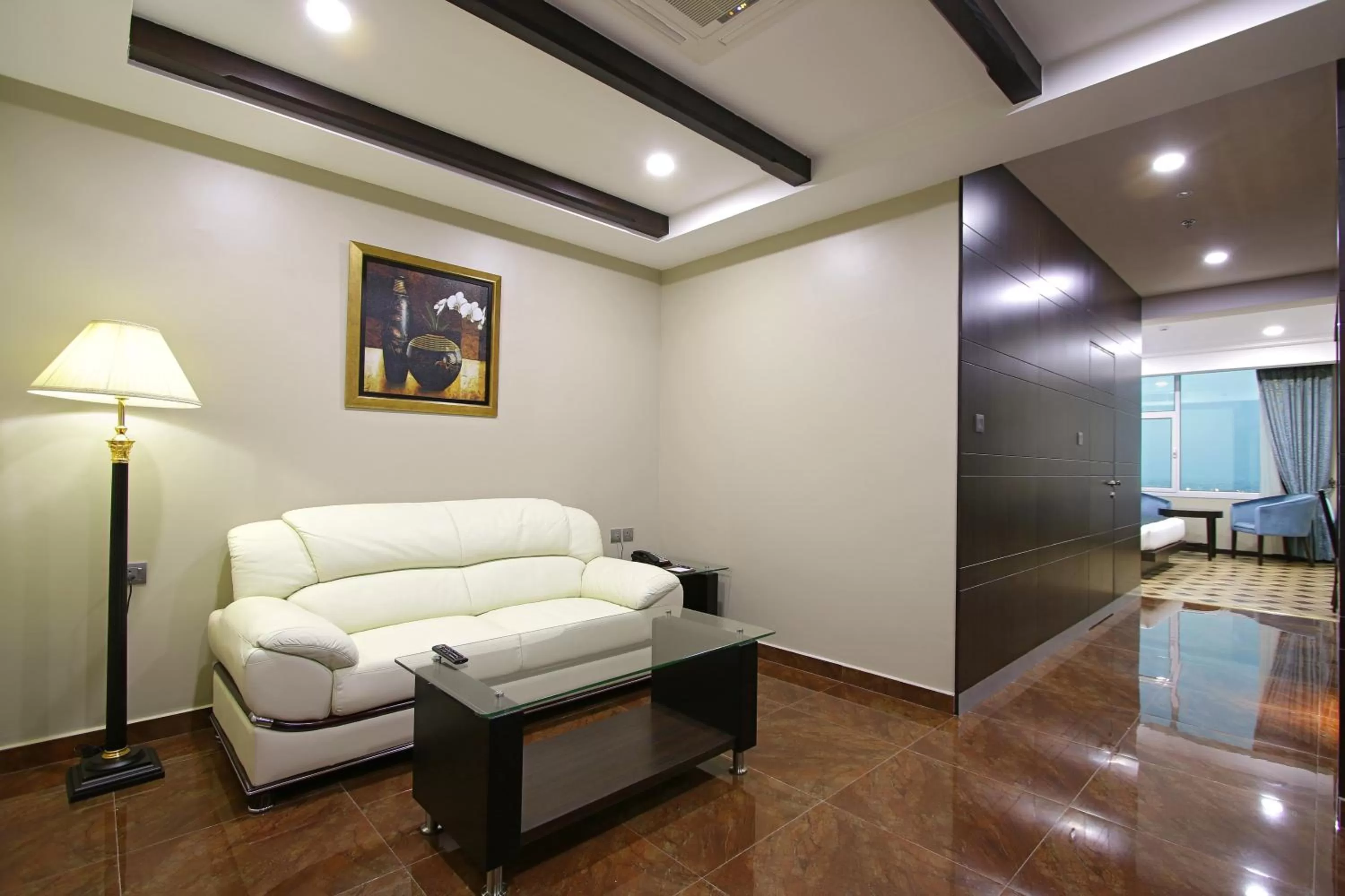 Living room in Park Regis Lotus Hotel