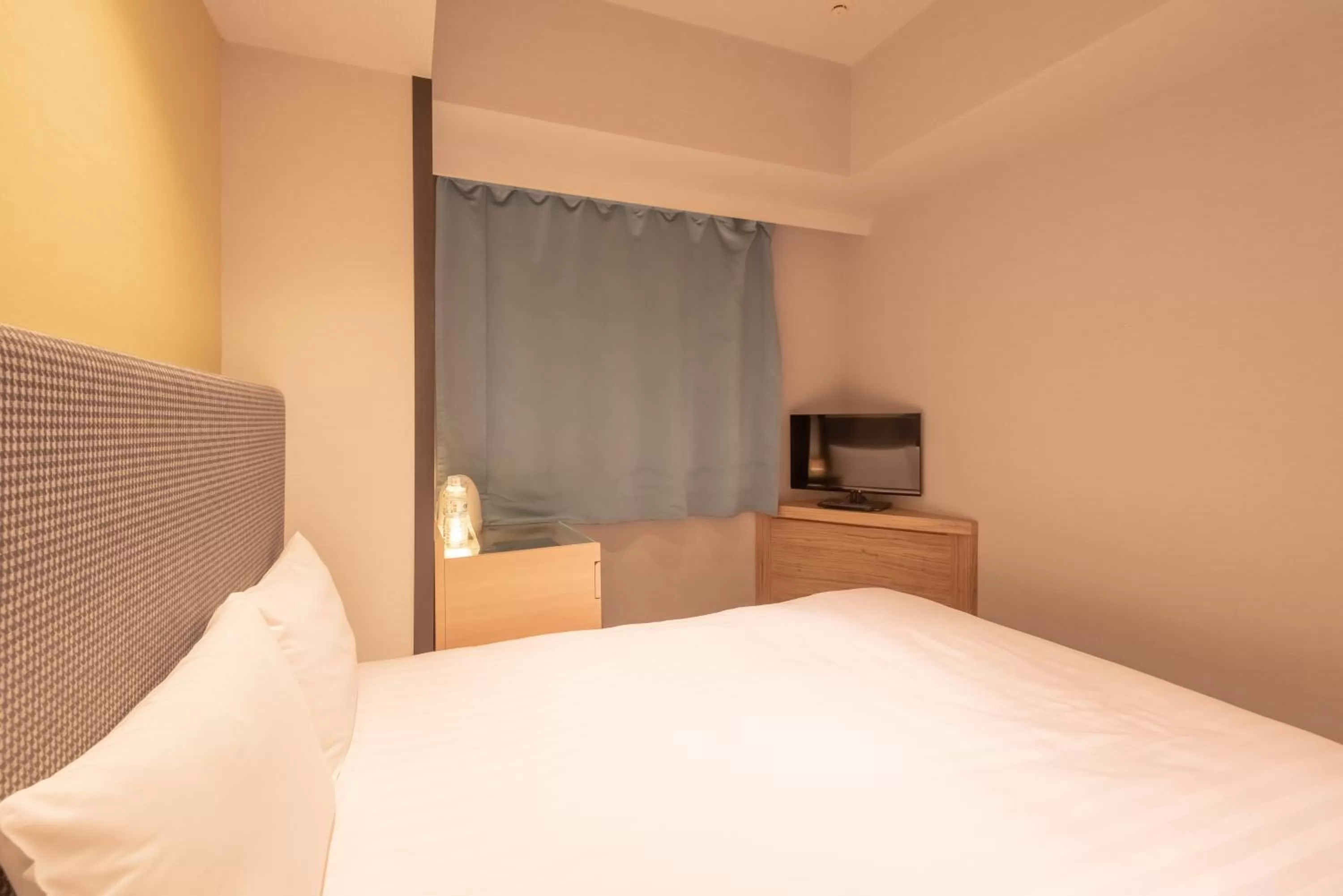 Bed in E Hotel Higashi Shinjuku