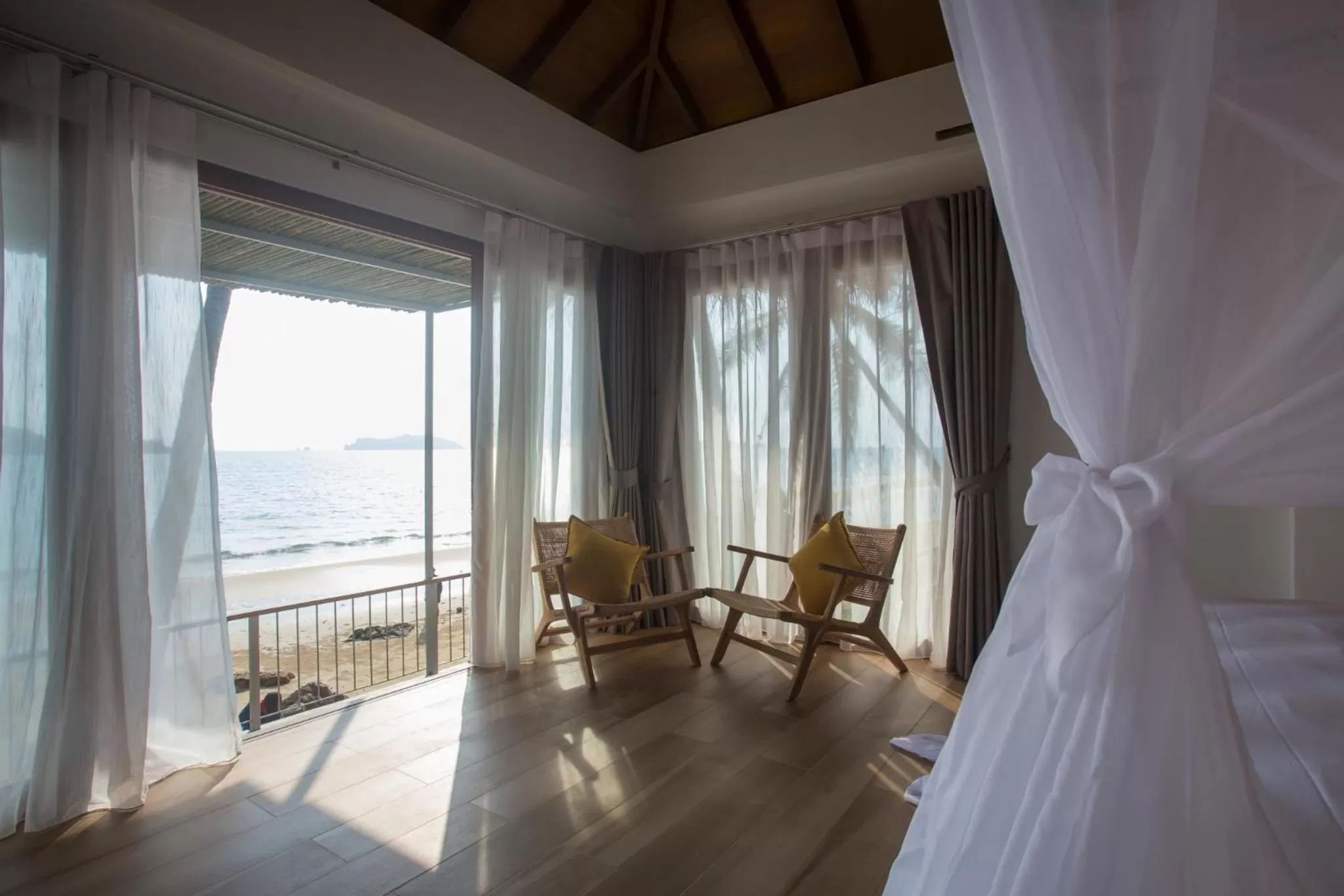 Bed in The Nest Private Beach Resort