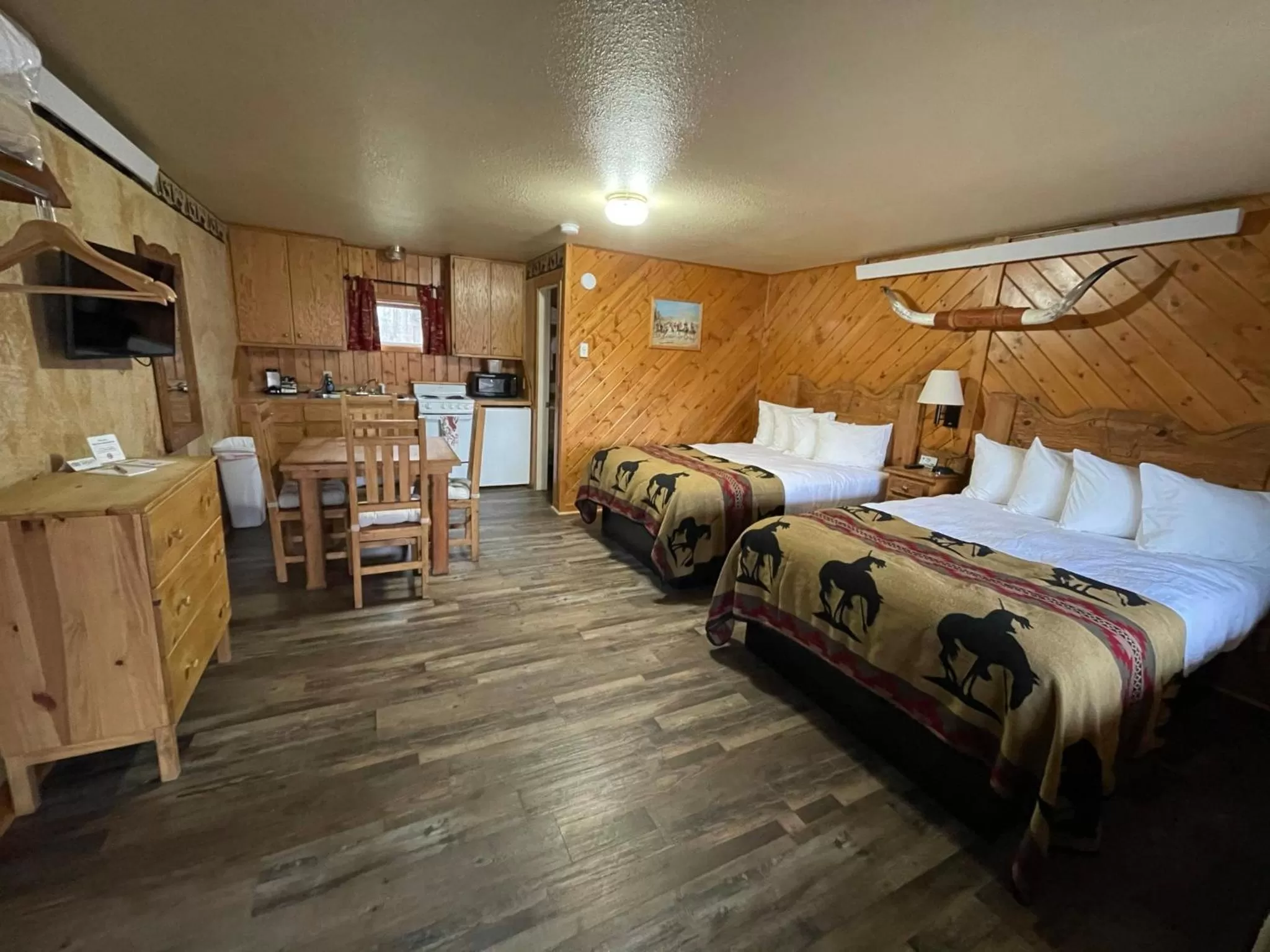 Bed in The Longhorn Ranch Resort Lodge & RV Park